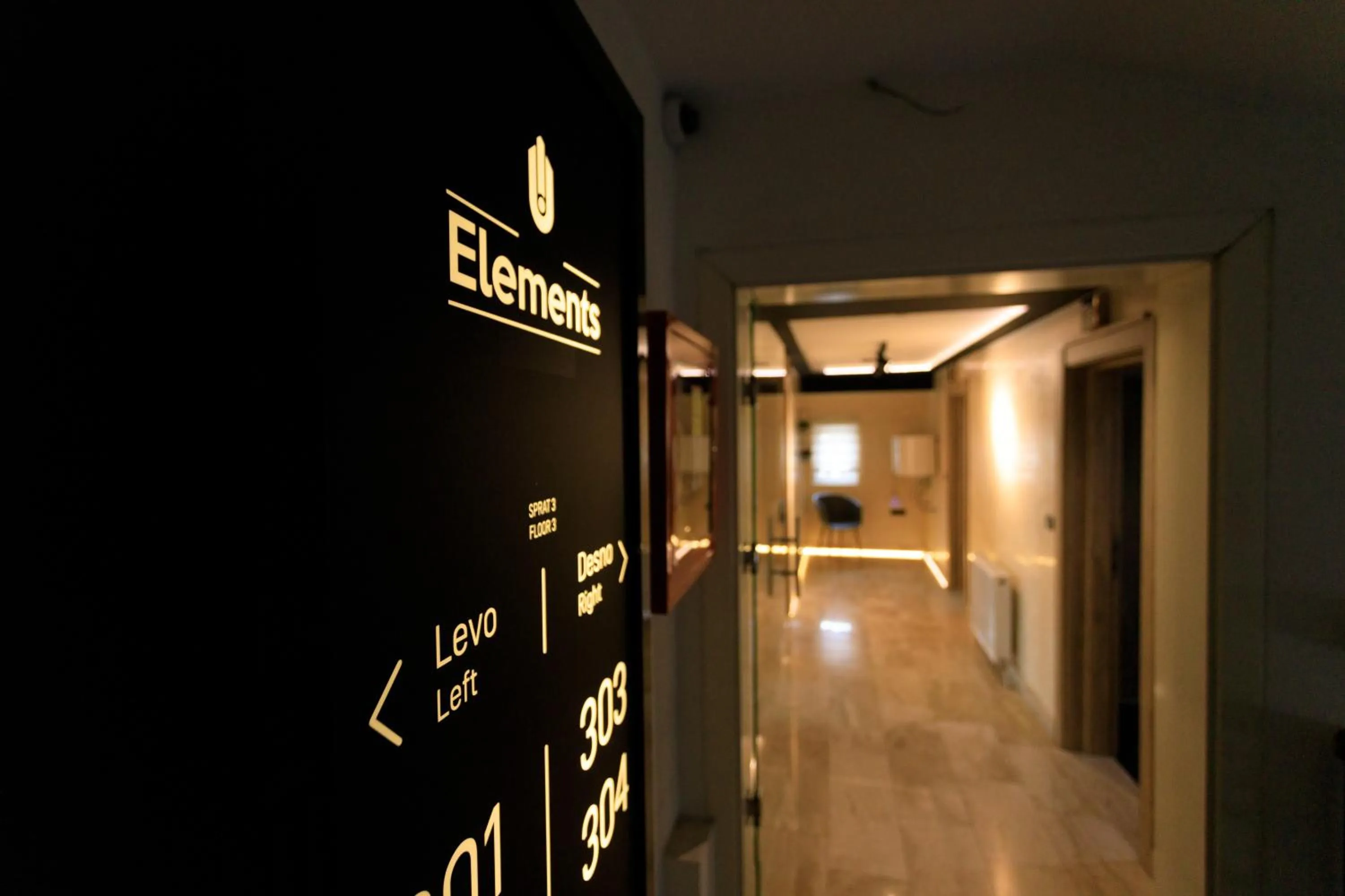 Property logo or sign in Hotel Elements