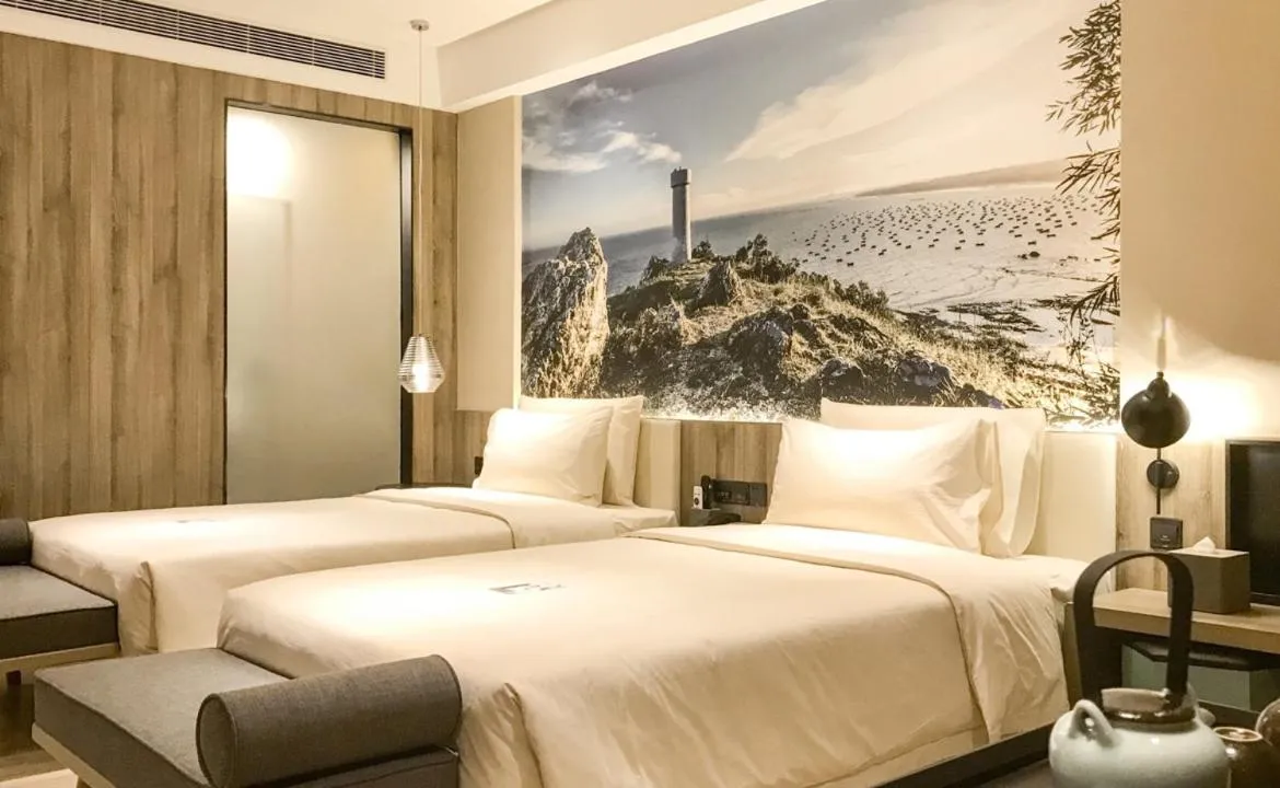 Bed in Atour Hotel High Speed Railway Station Maoming