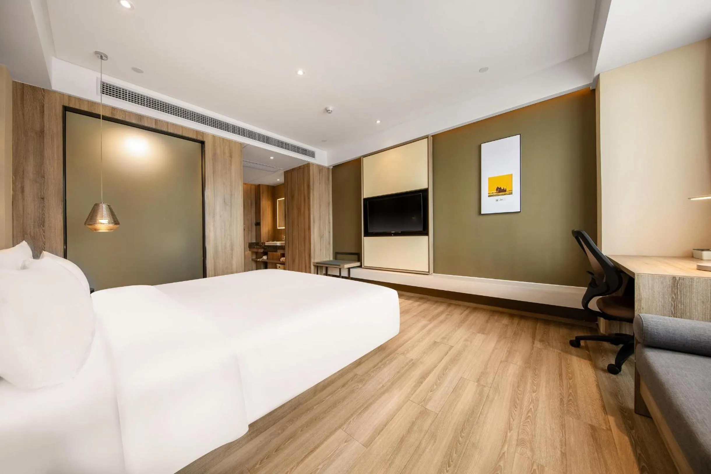 Bed in Atour Hotel High Speed Railway Station Maoming