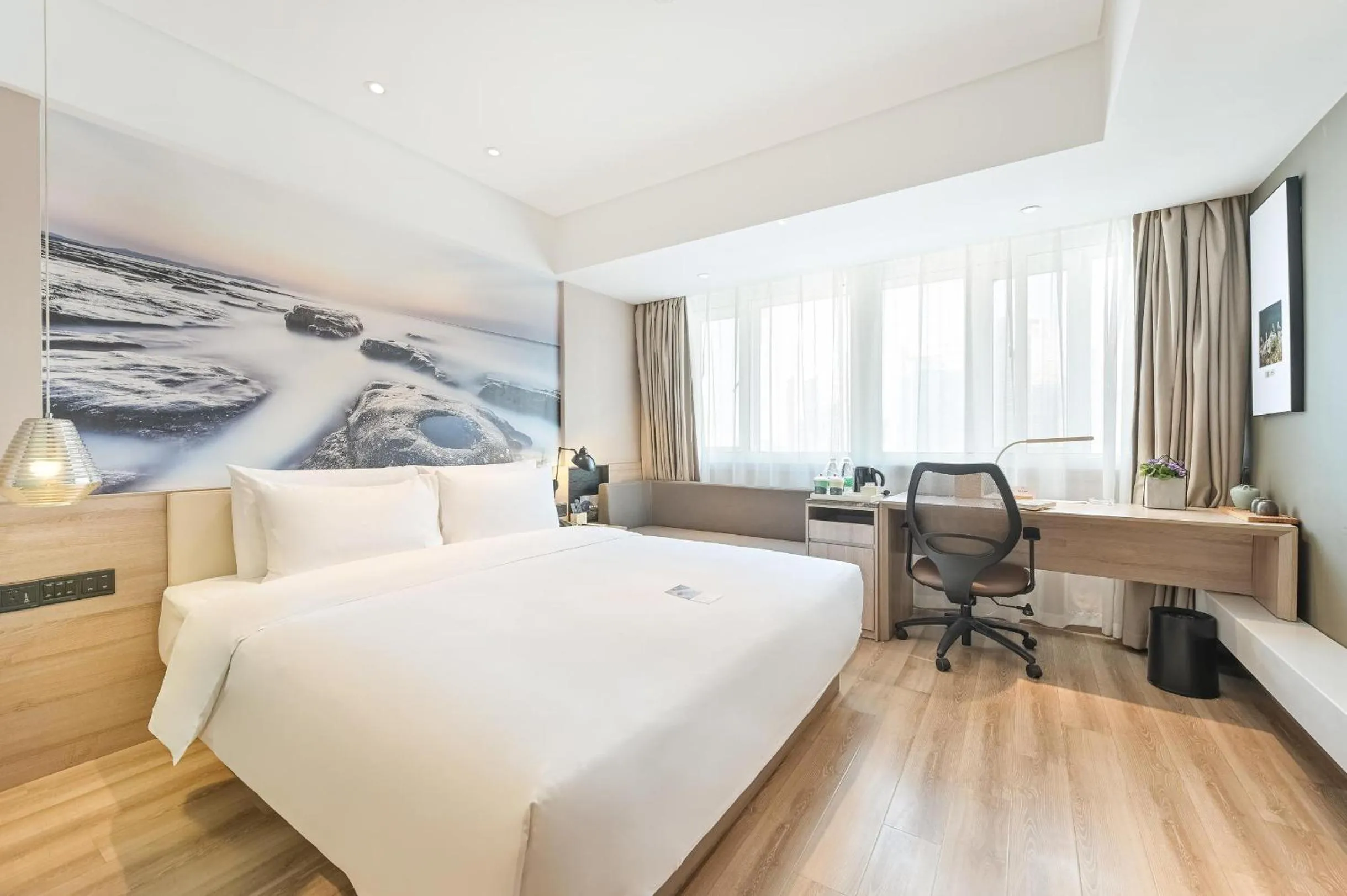 Bed in Atour Hotel Railway Station Dalian