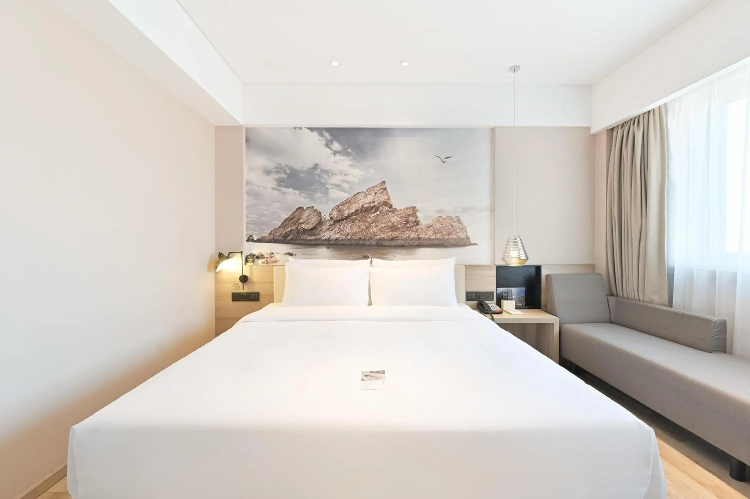 Bed in Atour Hotel Railway Station Dalian