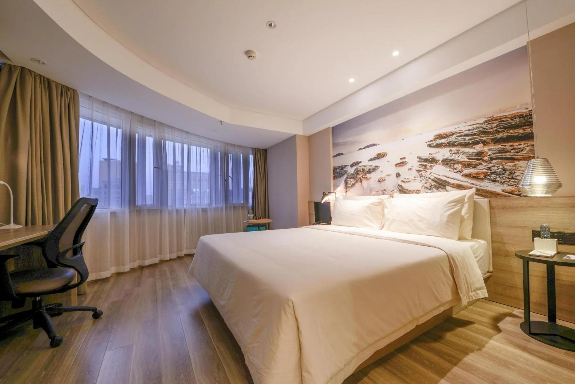 Bed in Atour Hotel Railway Station Dalian