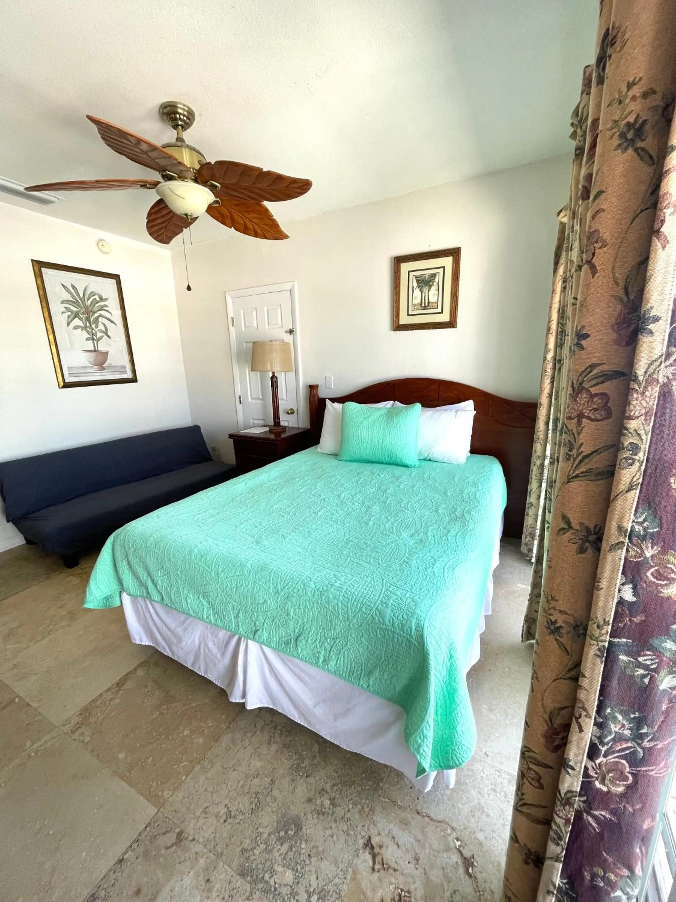 Bed in Coconut Cove Resort & Marina