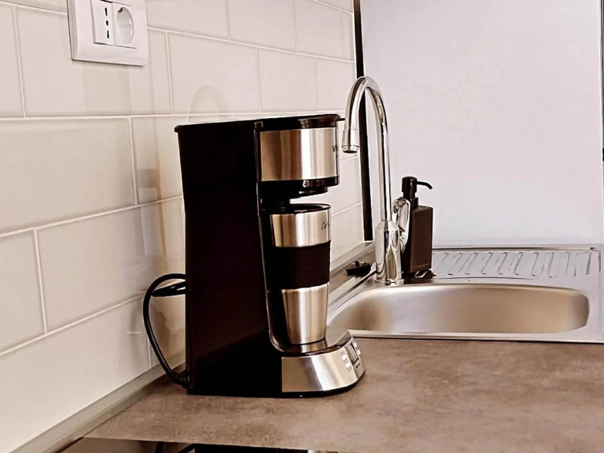 Kitchen or kitchenette in Apartments K & N