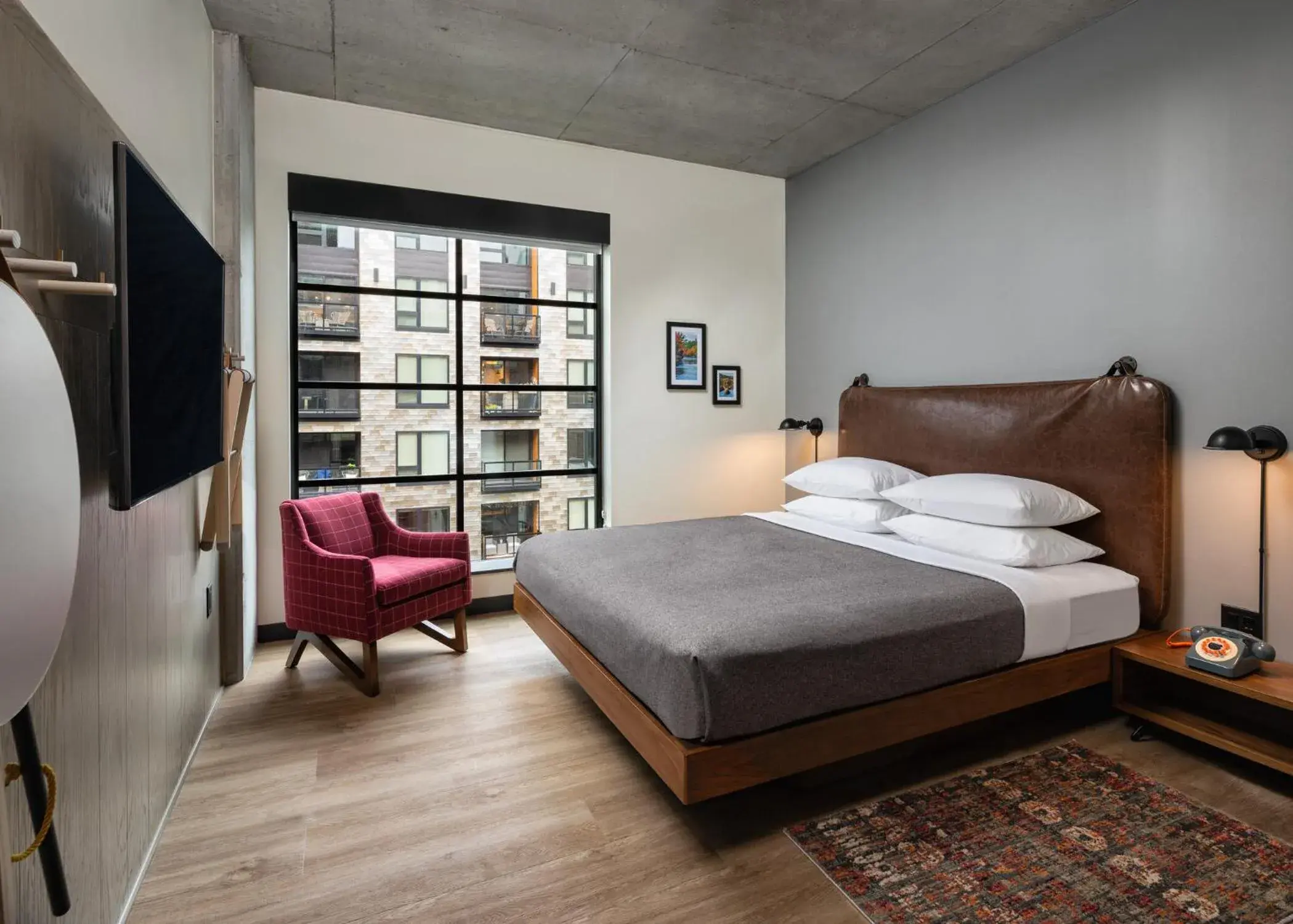 Guest room, 1 King, City view in Moxy Minneapolis Downtown Guest room, 1 King, City view in Moxy Minneapolis Downtown