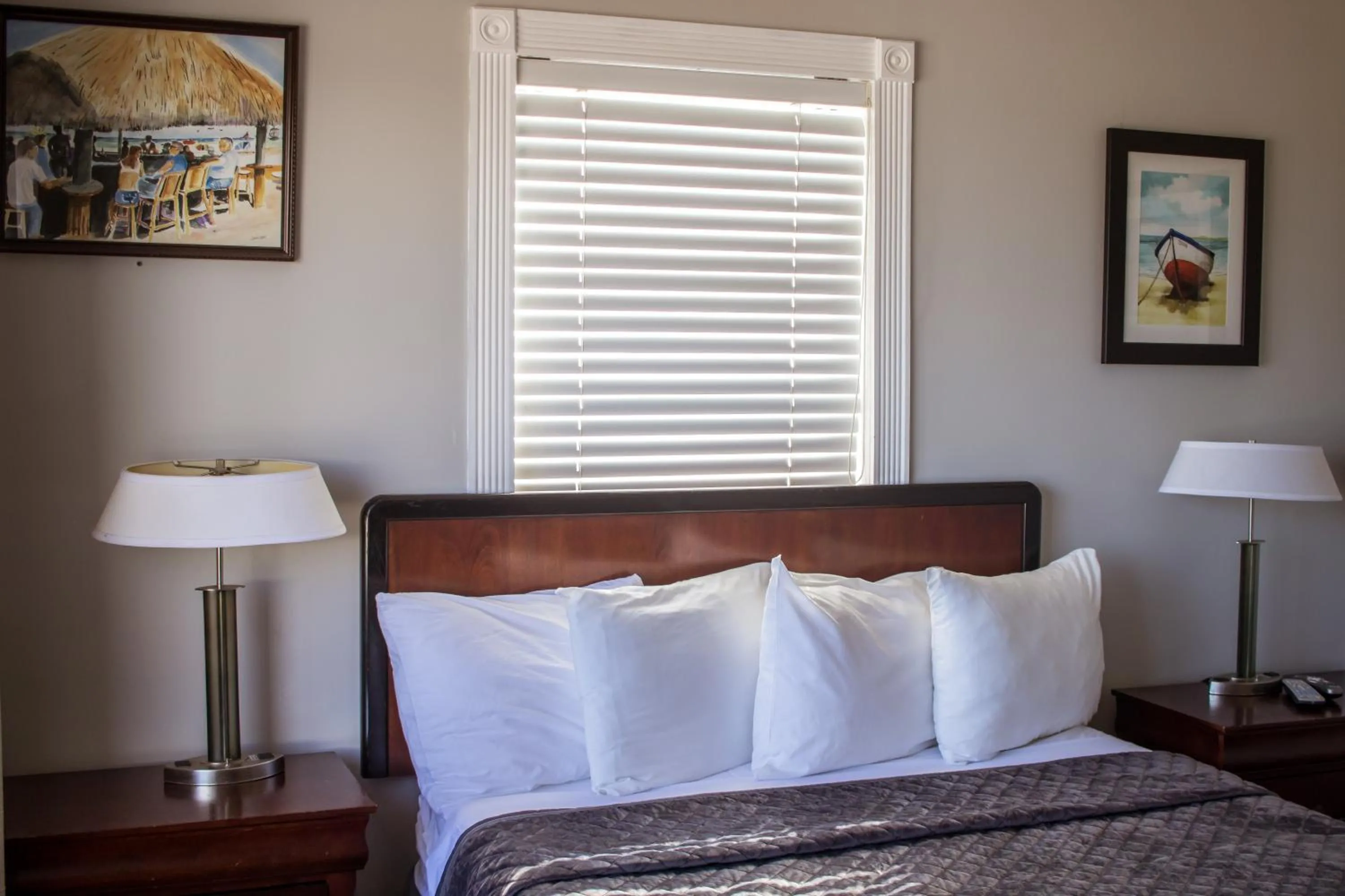 Bed in Riptide Oceanfront Hotel