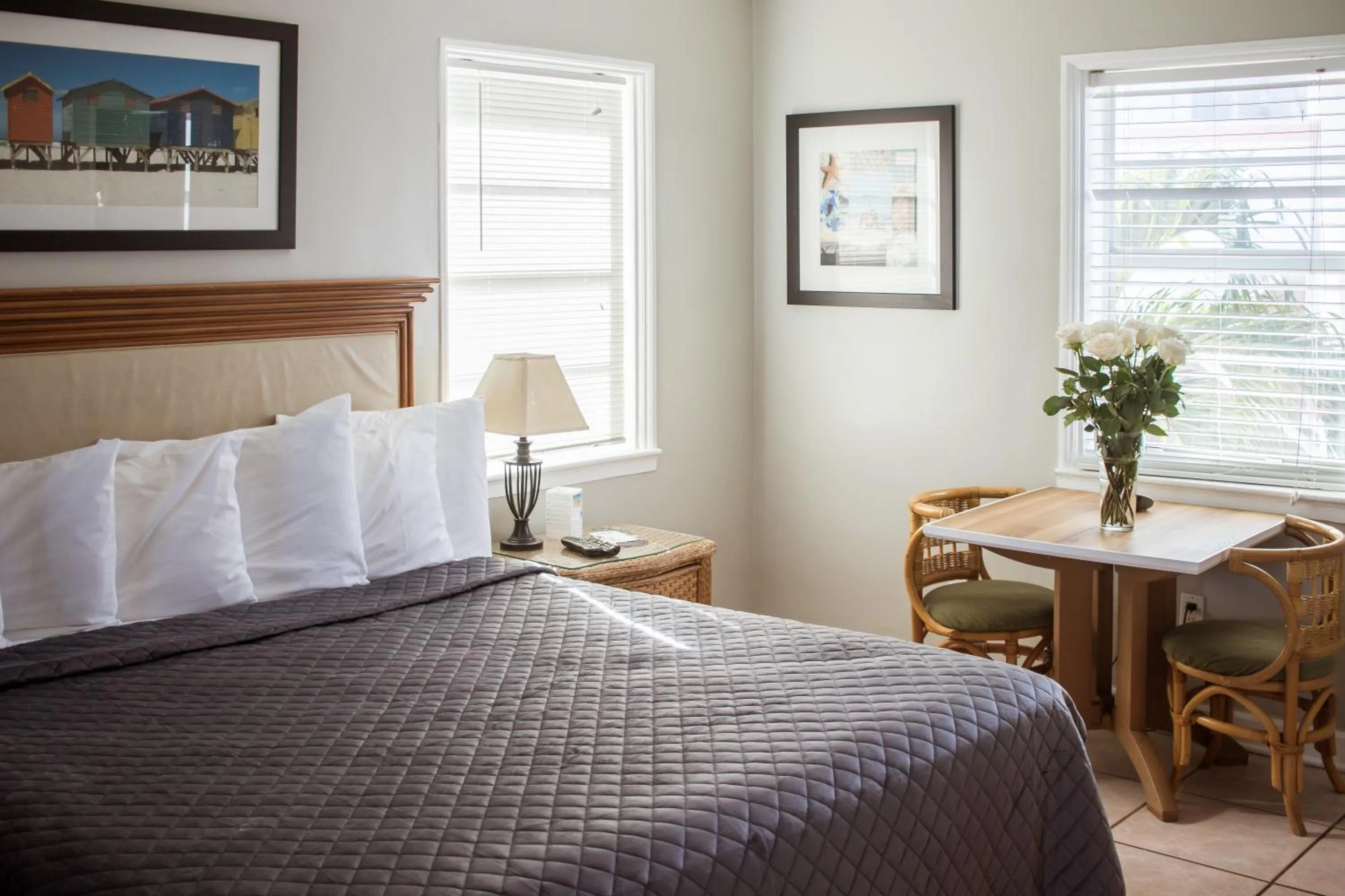 Bed in Riptide Oceanfront Hotel