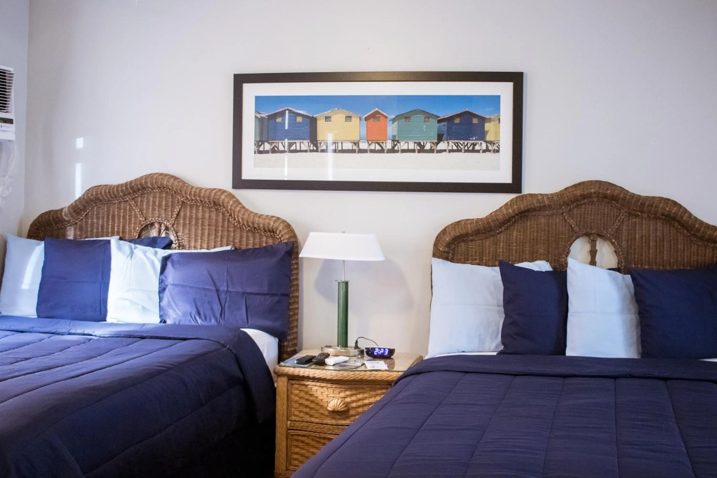 Bed in Riptide Oceanfront Hotel