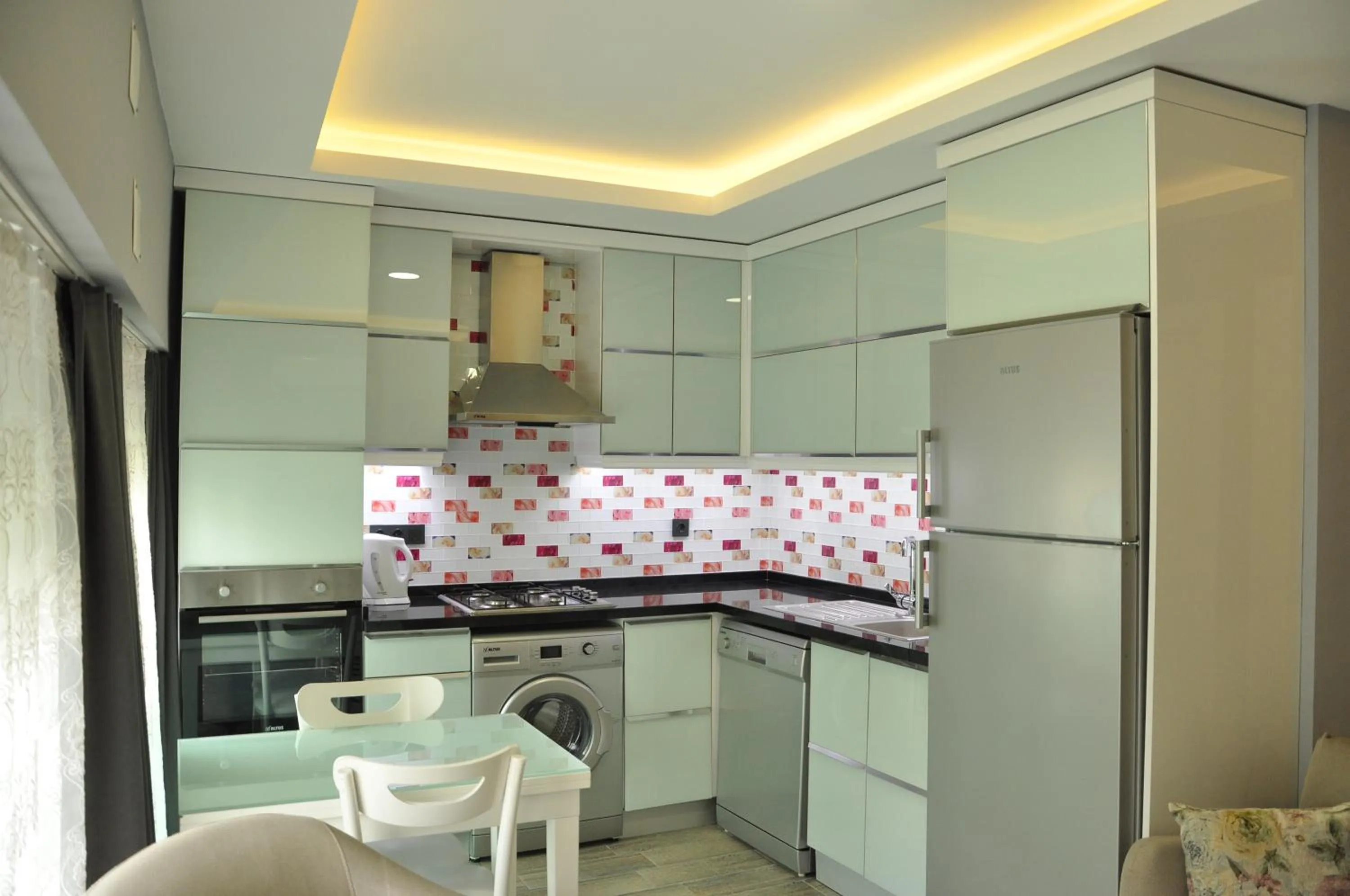 Kitchen or kitchenette in X SUITE APART