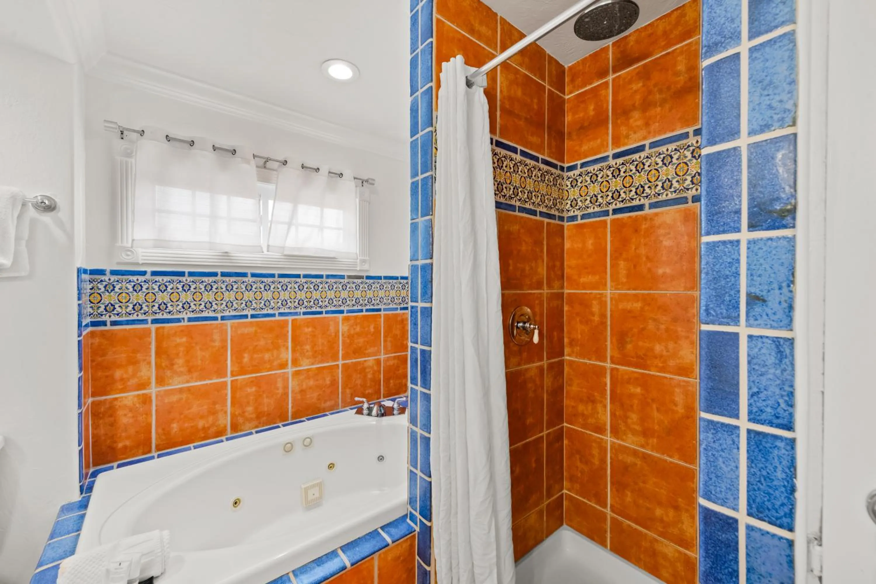 Shower in Tropic Isle At Anna Maria Island Inn