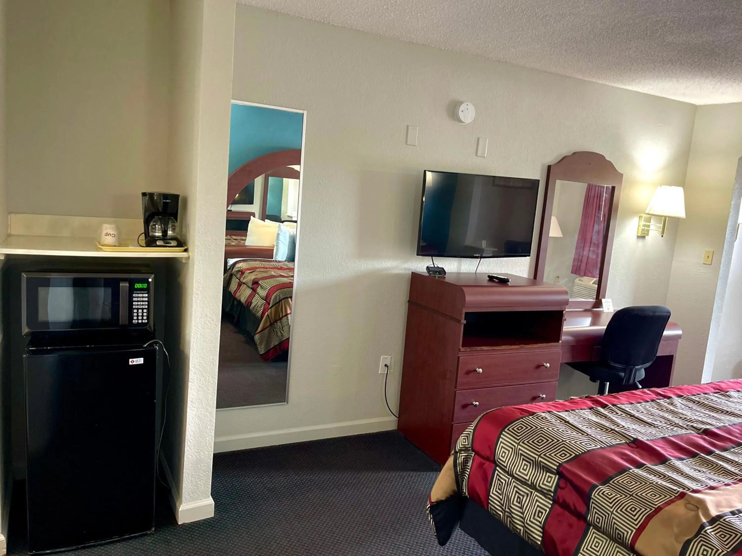 Bed in Luxury Inn & Suites