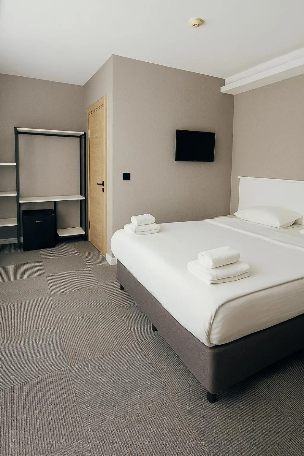 Bed in Blue Point Hotel