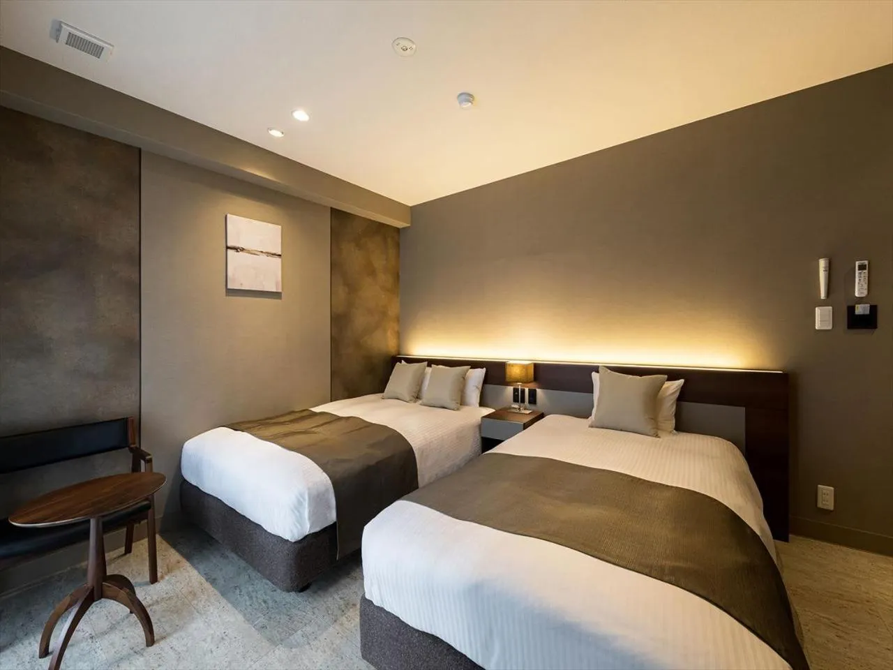 Bed in HOTEL SHINPOIN OSAKA