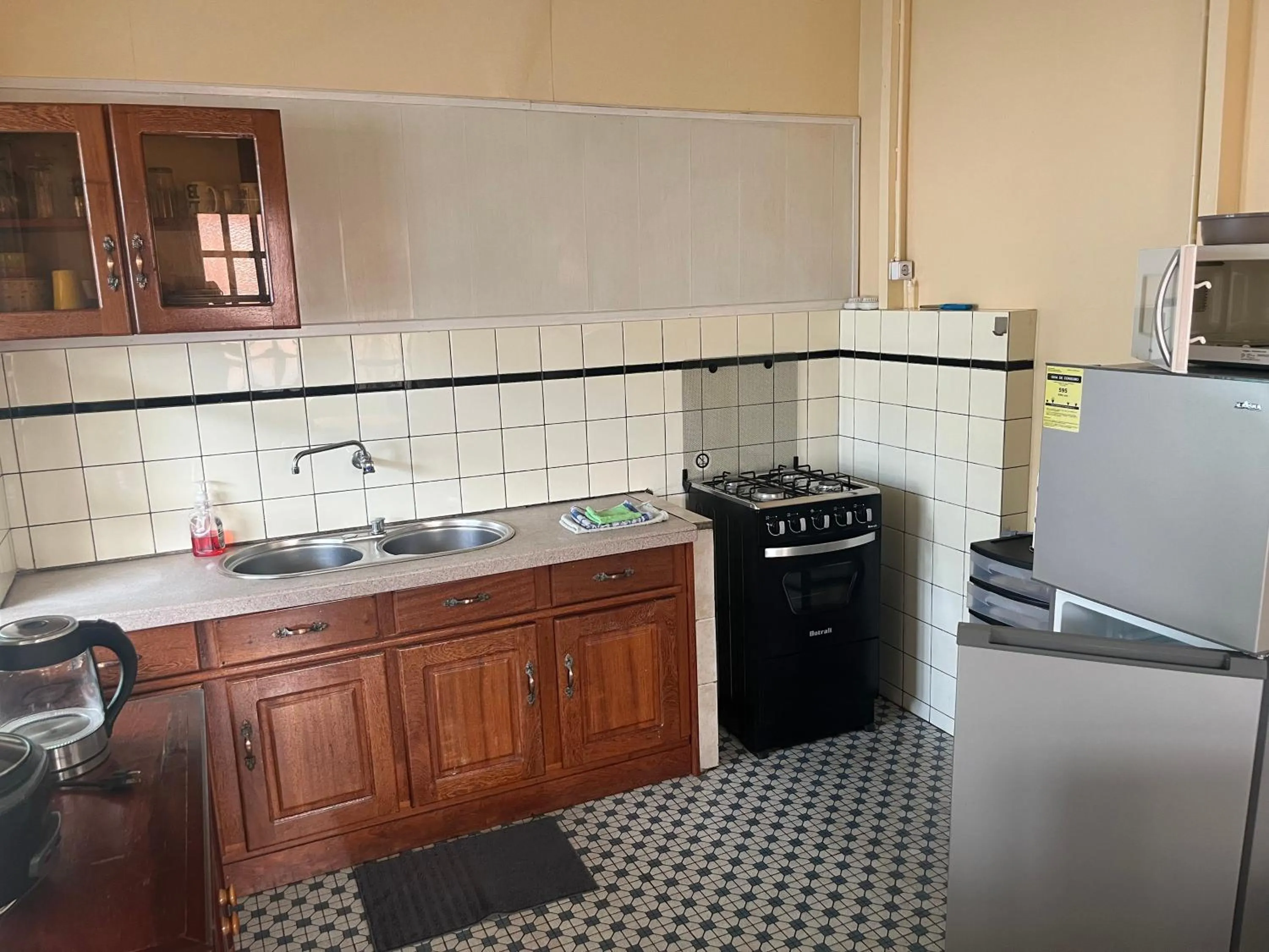 Kitchen or kitchenette in Max Garden and Pool