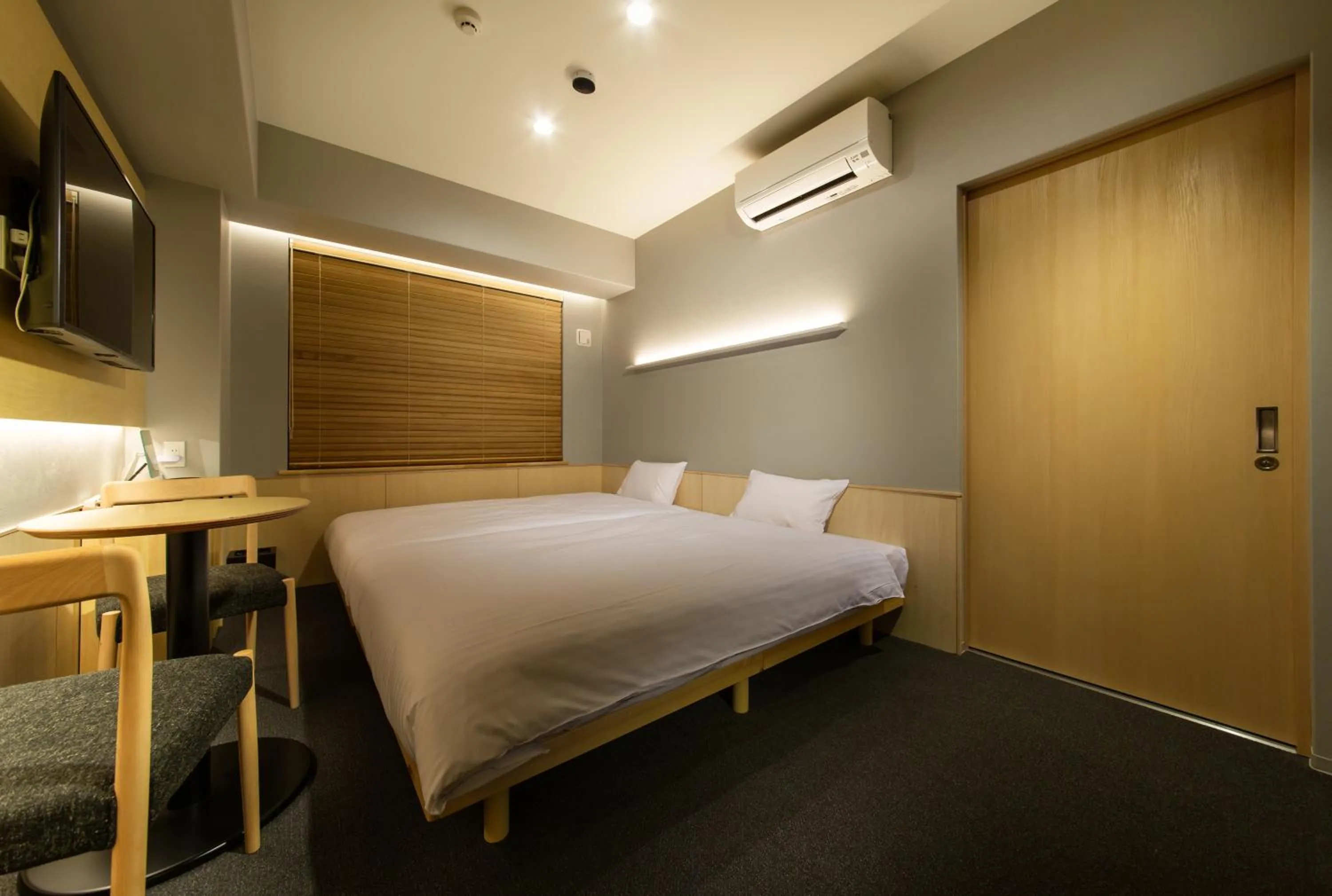 Photo of the whole room, Bed in HOTEL AMANEK Kyoto Kawaramachi Gojo