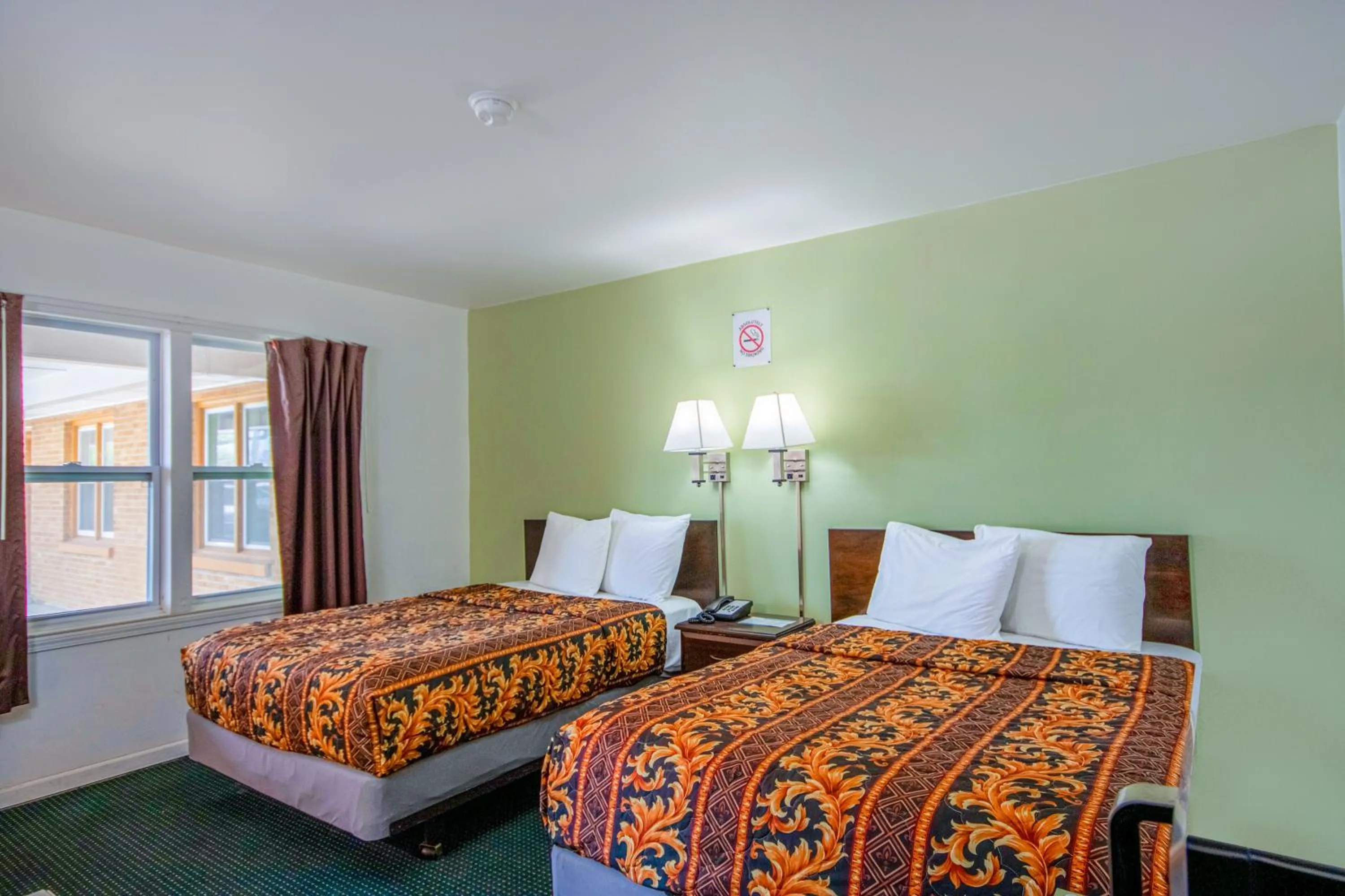 Bedroom, Bed in OYO Travelier Motel