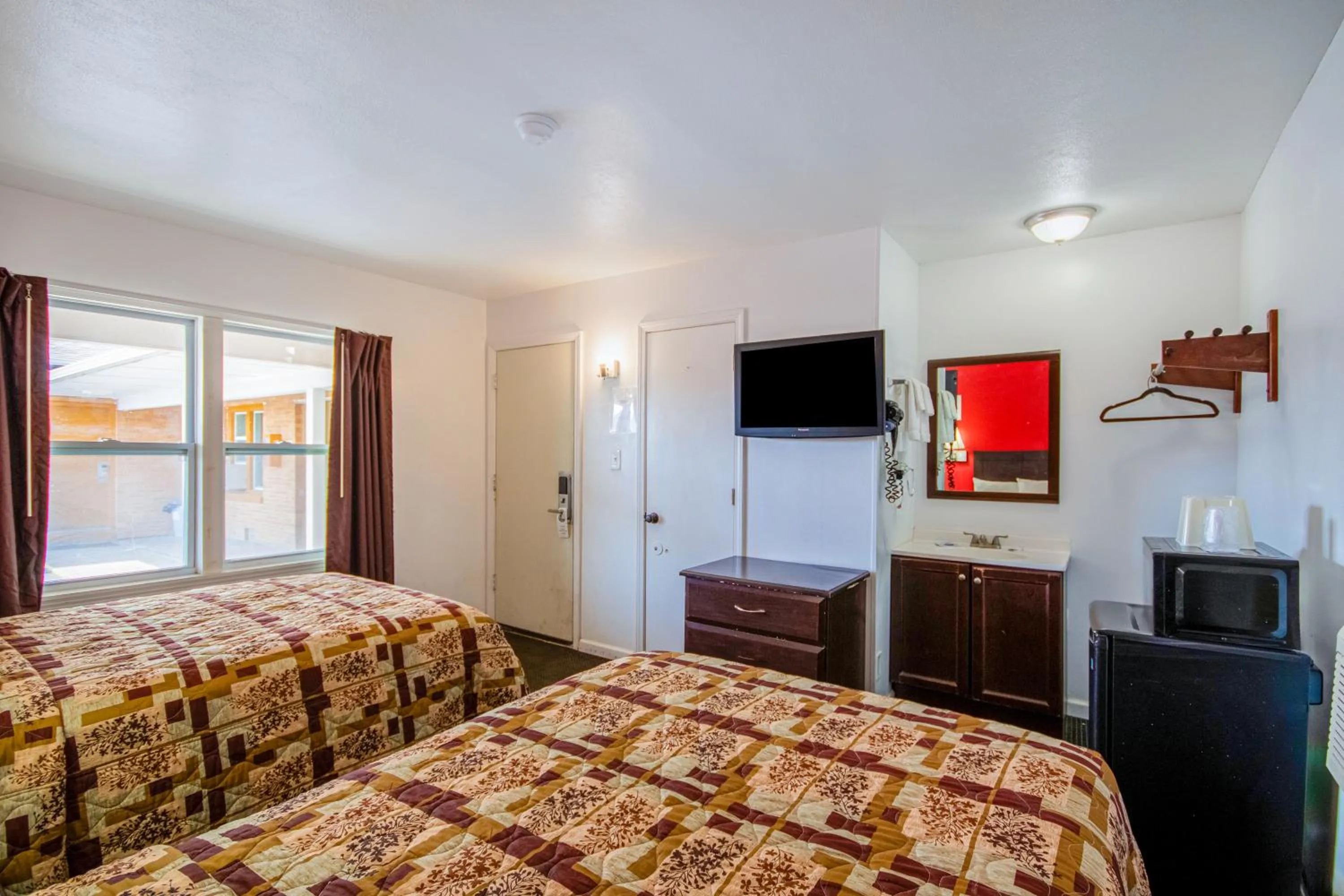 Bedroom, Bed in OYO Travelier Motel