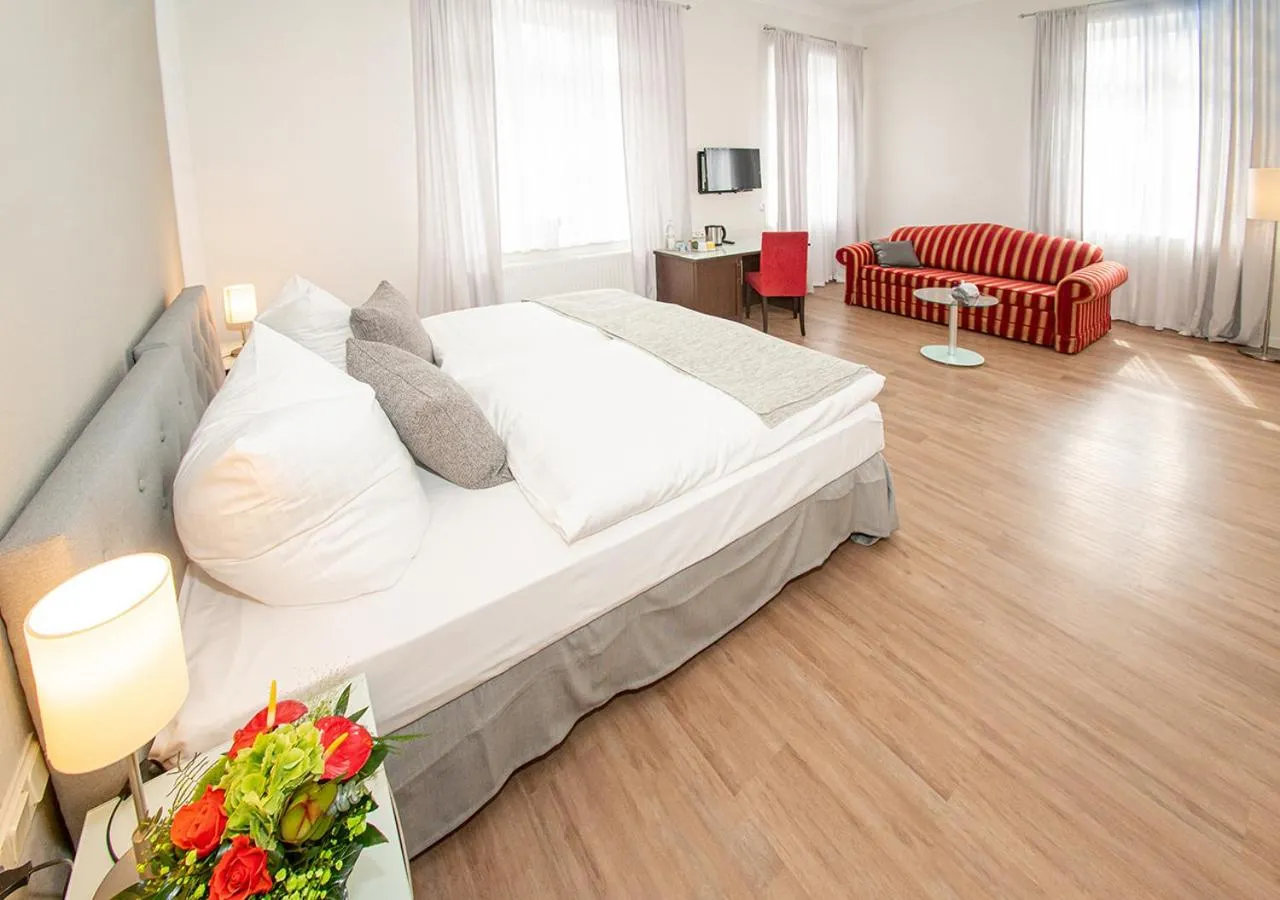 Bed in Gästehaus fliegendes Perlhuhn Borgfeld