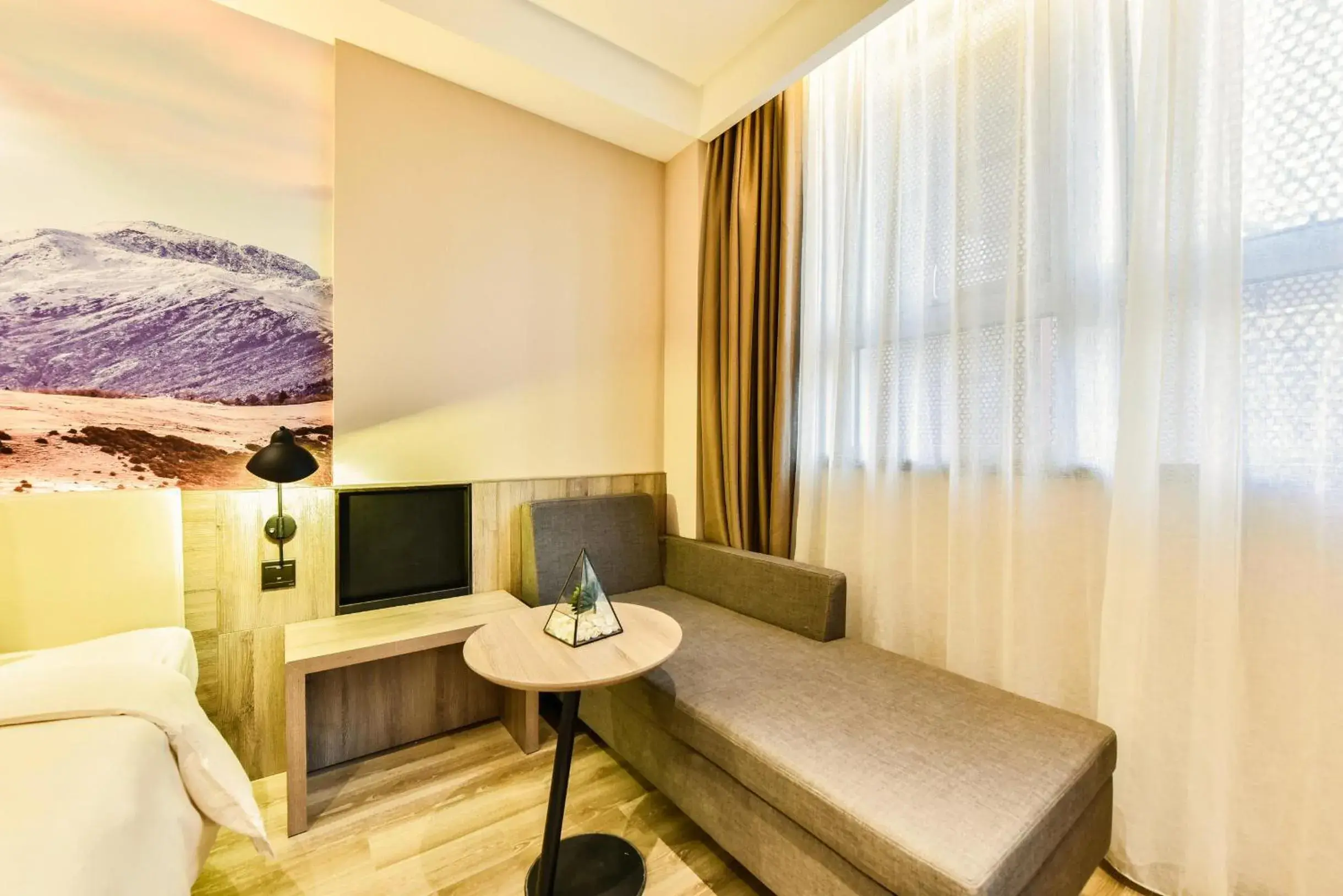 Seating area, Bed in Atour Hotel Capital Airport Beijing Seating area, Bed in Atour Hotel Capital Airport Beijing