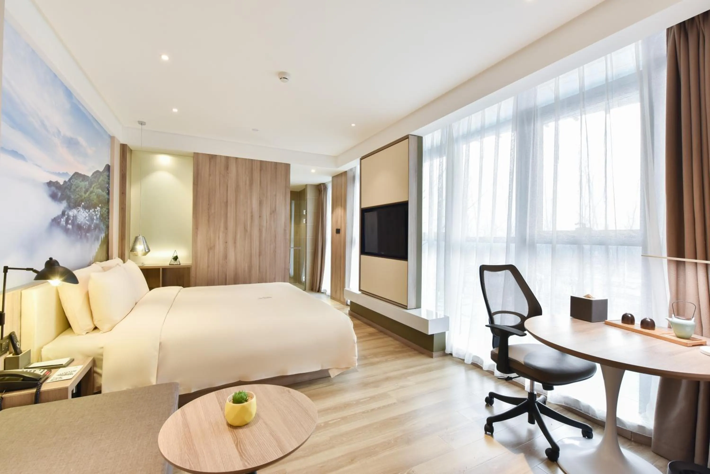 Seating area, Bed in Atour Hotel Capital Airport Beijing