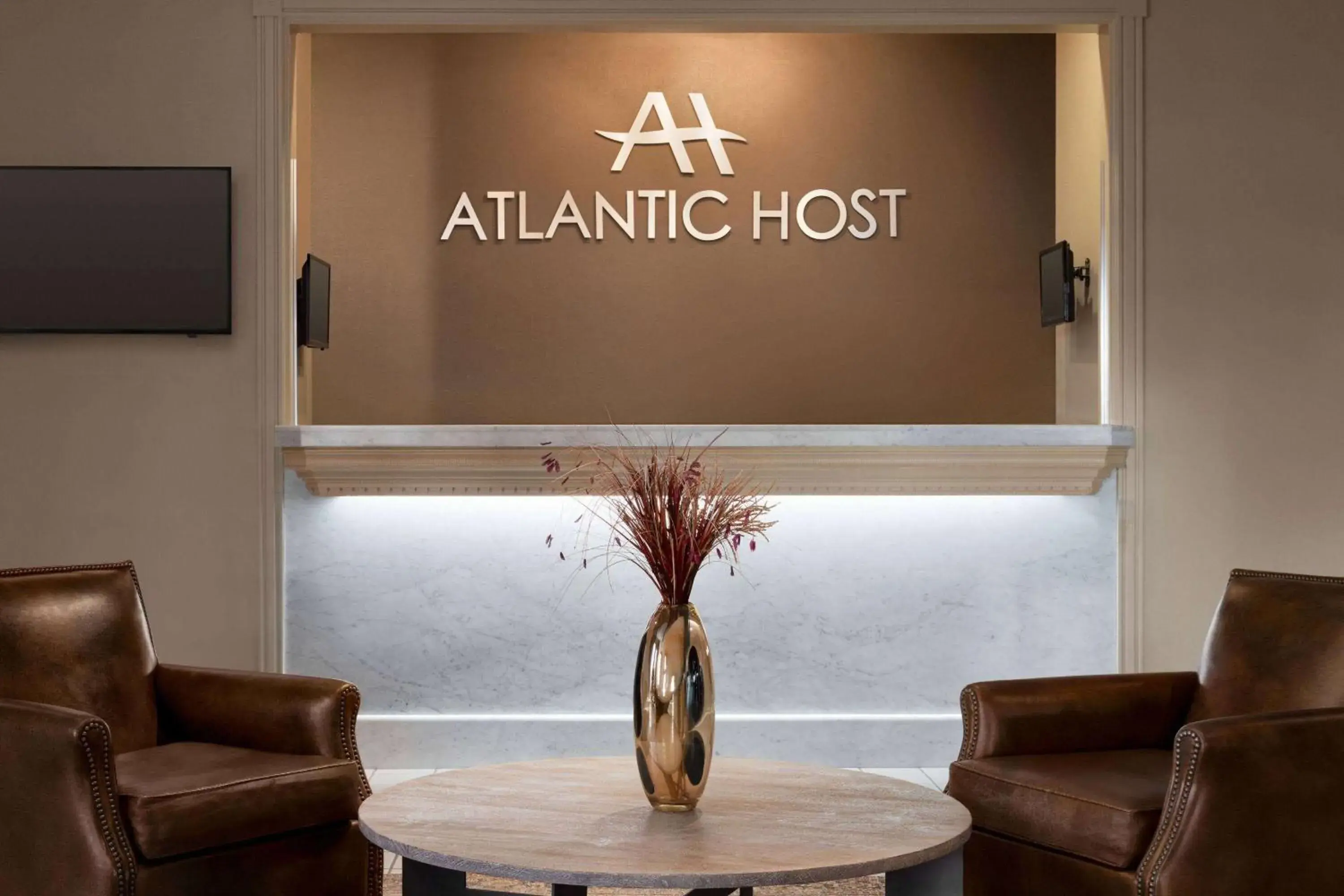 Lobby or reception in Atlantic Host Hotel, Trademark Collection by Wyndham Lobby or reception in Atlantic Host Hotel, Trademark Collection by Wyndham