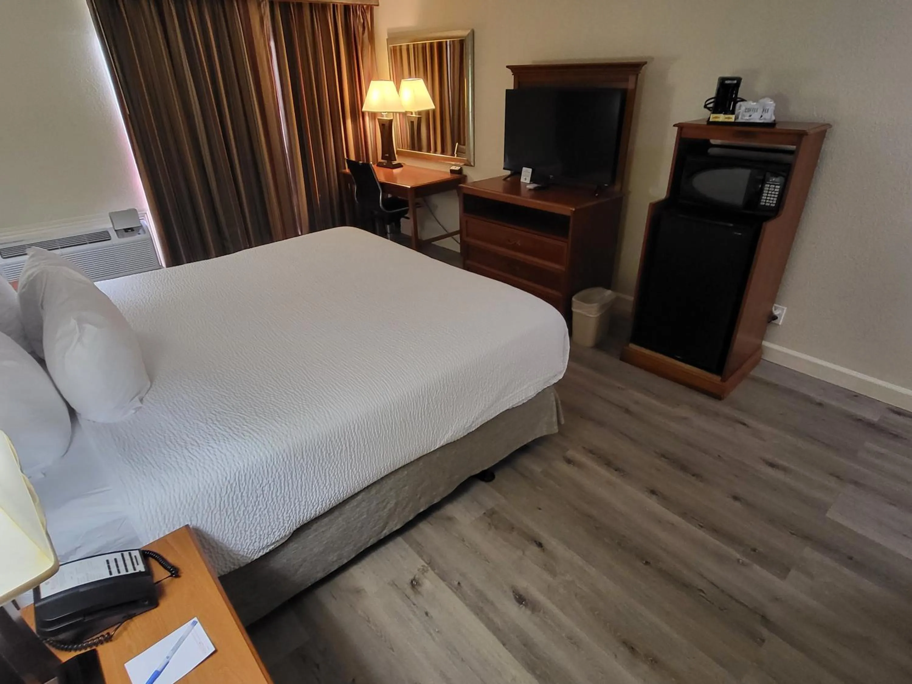 Bed in Ramada by Wyndham Houston Intercontinental Airport East