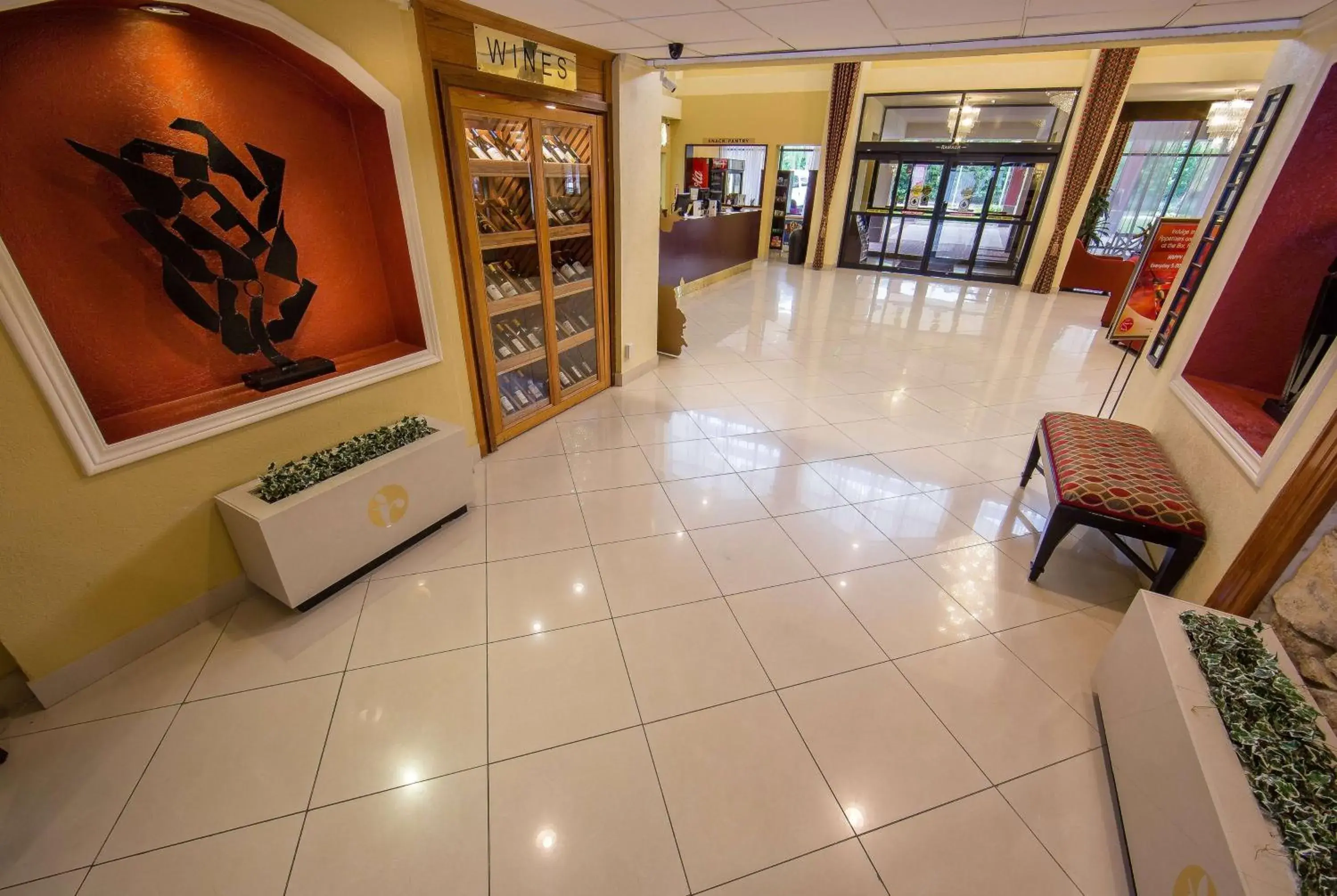 Lobby or reception in Ramada by Wyndham Houston Intercontinental Airport East Lobby or reception in Ramada by Wyndham Houston Intercontinental Airport East