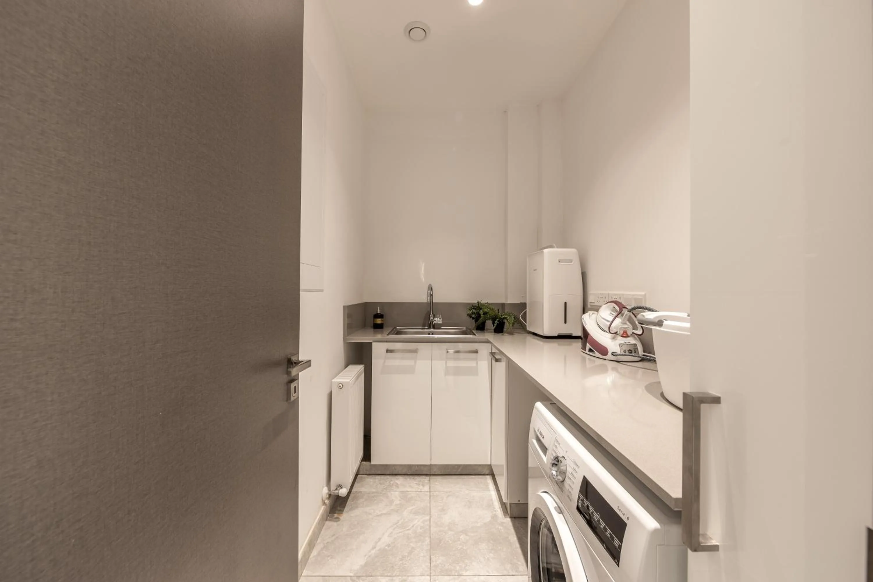 dishwasher in Fig Tree Bay Residences 7