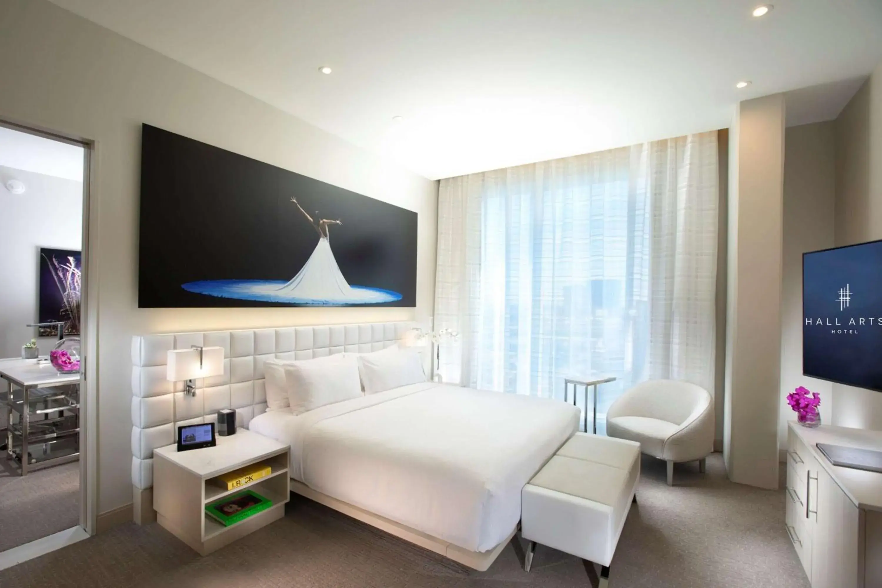 Bed in HALL Arts Hotel Dallas, Curio Collection by Hilton Bed in HALL Arts Hotel Dallas, Curio Collection by Hilton