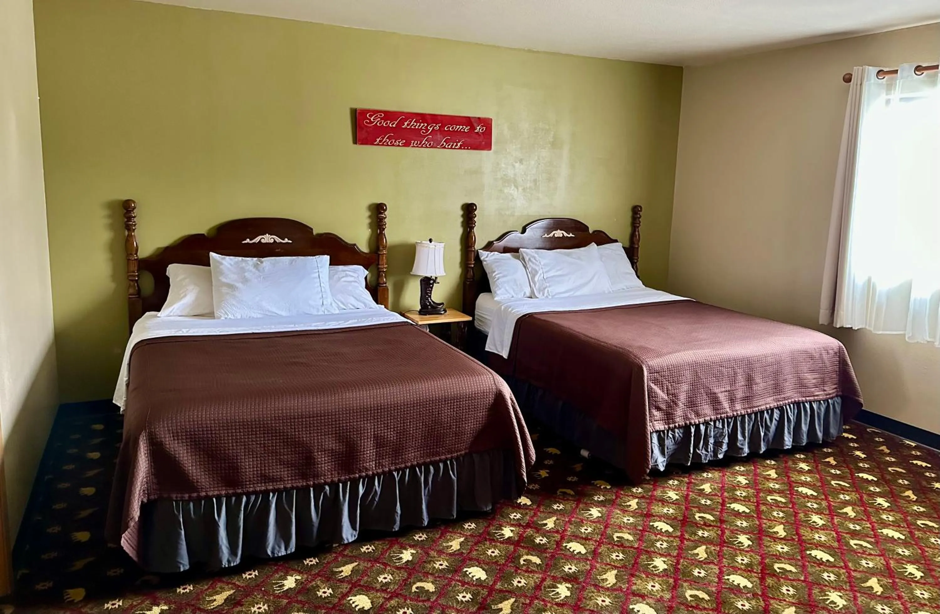 Bed in Alaska Angler's Inn