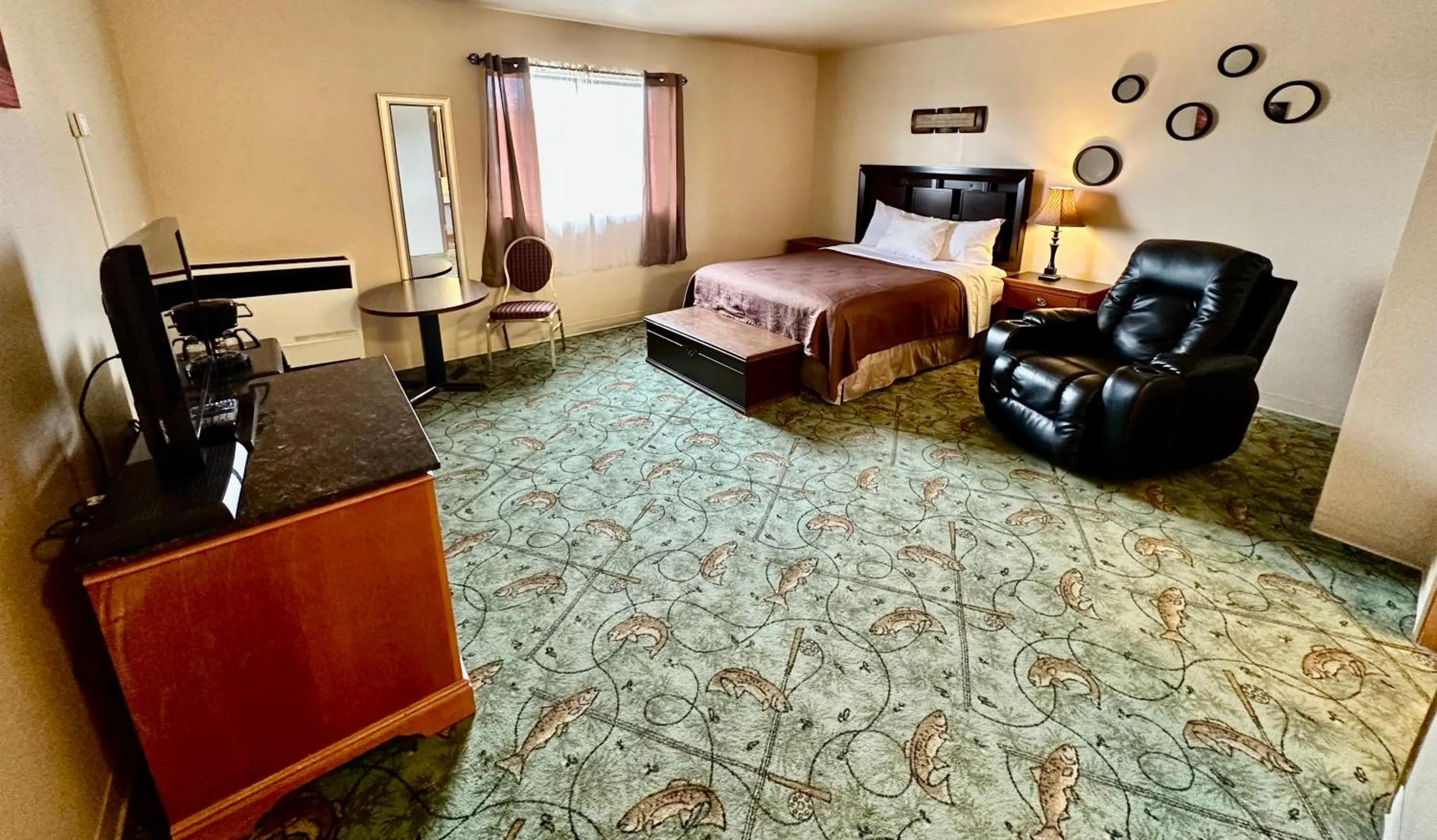 Bed in Alaska Angler's Inn