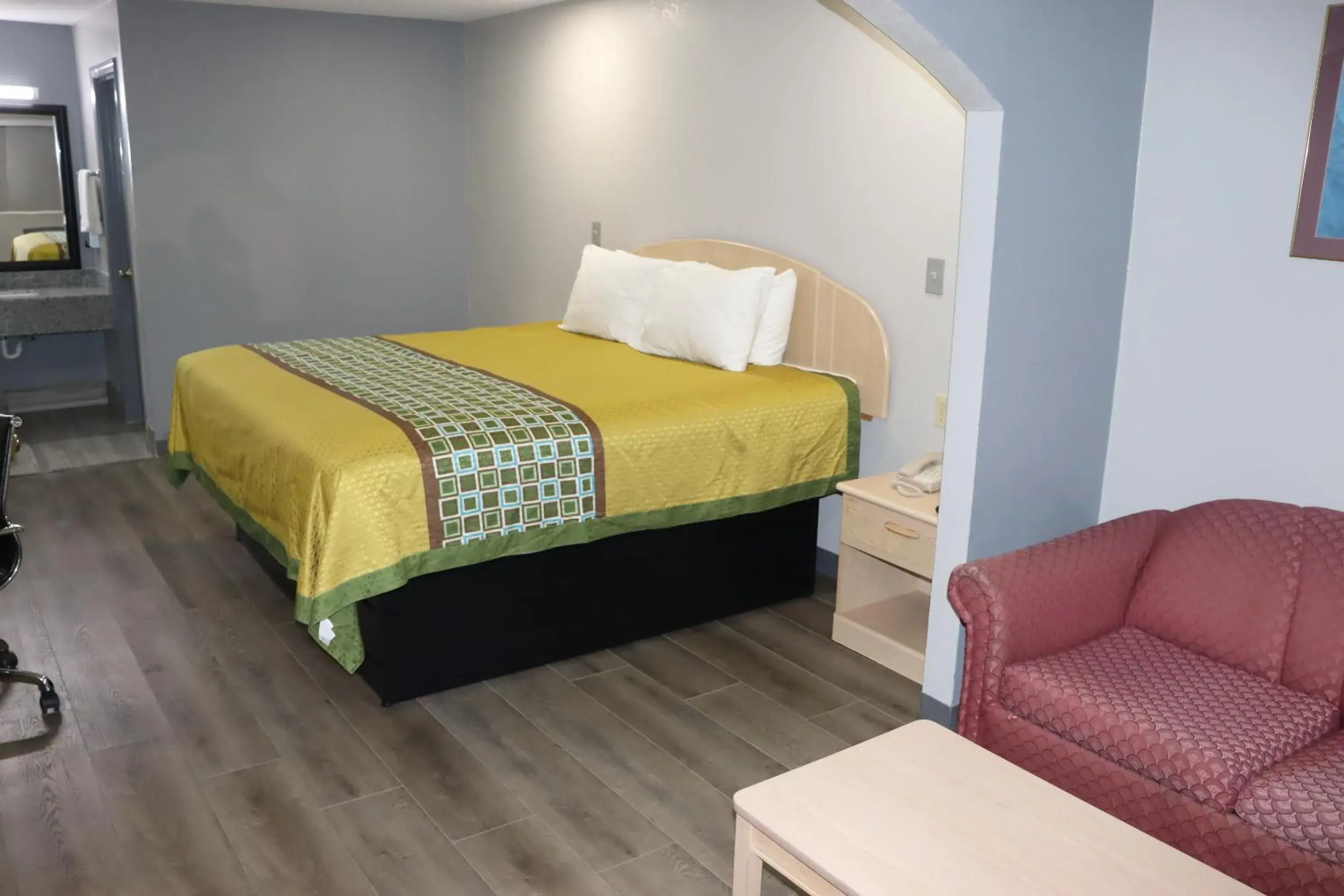 Living room, Bed in Americas Best Value Inn Cabot Living room, Bed in Americas Best Value Inn Cabot