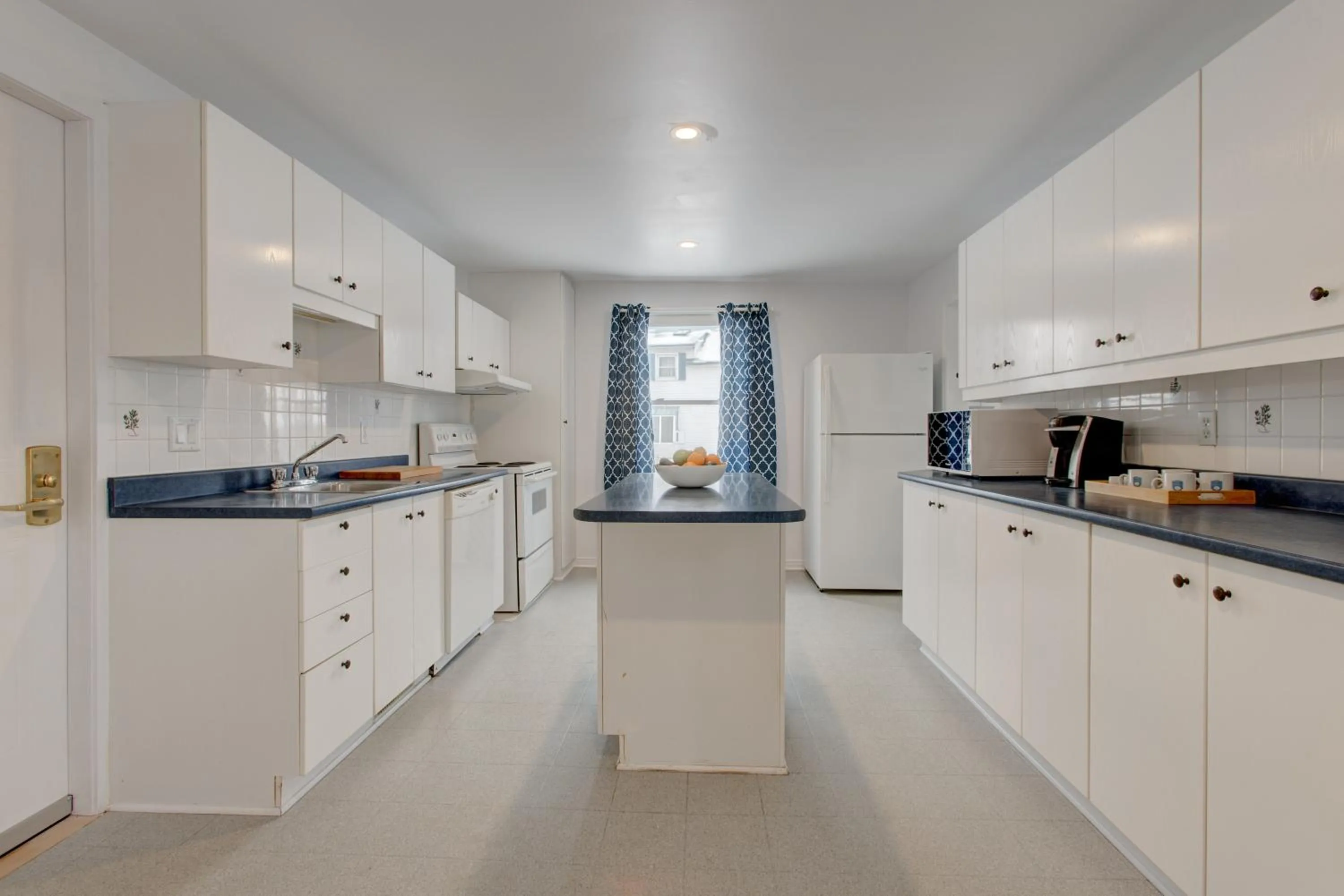 Kitchen or kitchenette in Auberge Handfield et Spa