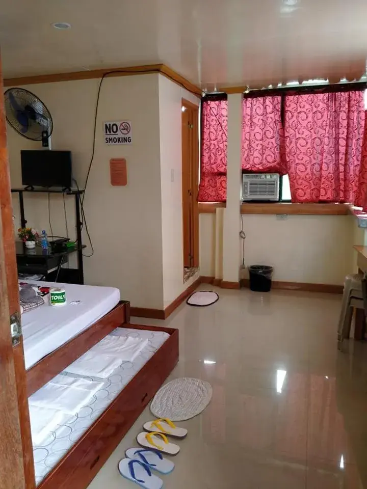 Standard Quadruple Room in Seacret Lodge Standard Quadruple Room in Seacret Lodge