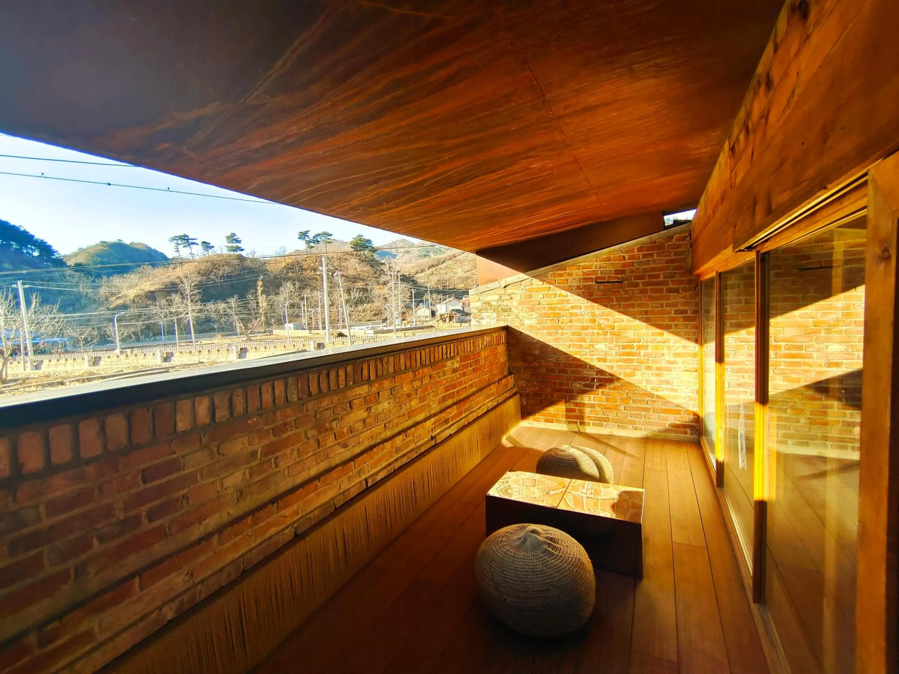 A Family Room with Balcony in CMYK Stoneyards by the Great Wall