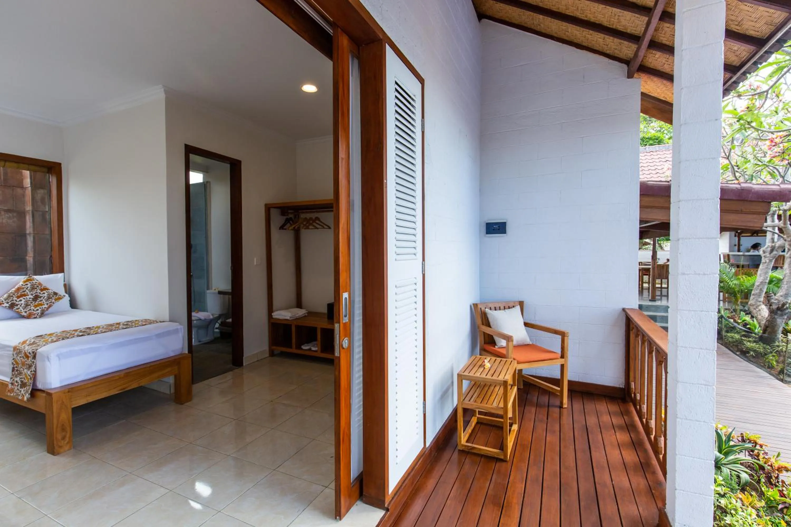 Balcony/Terrace, Bed in Nalika Beach Resort - Adults Only