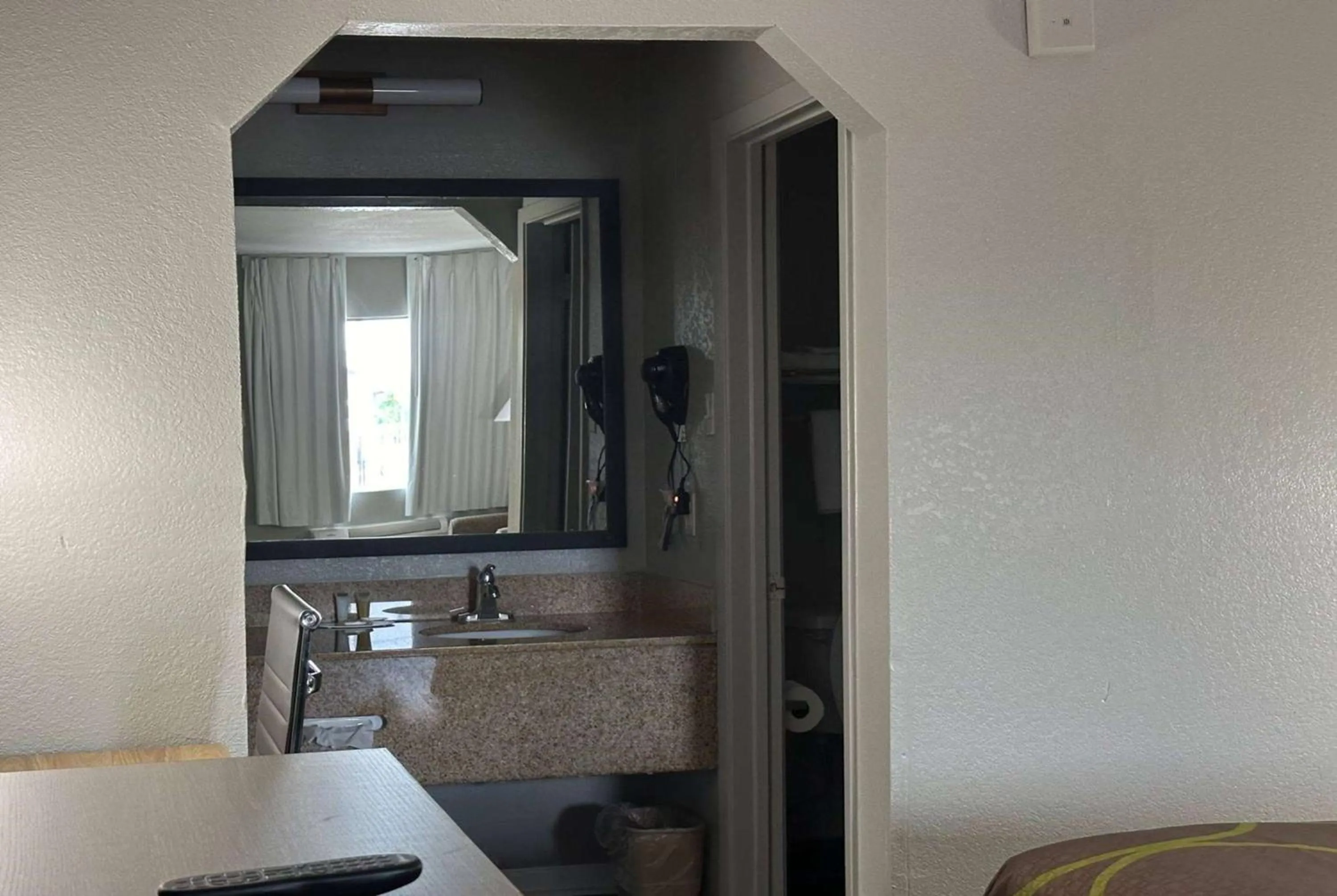 Bathroom in Super 8 by Wyndham Monroe