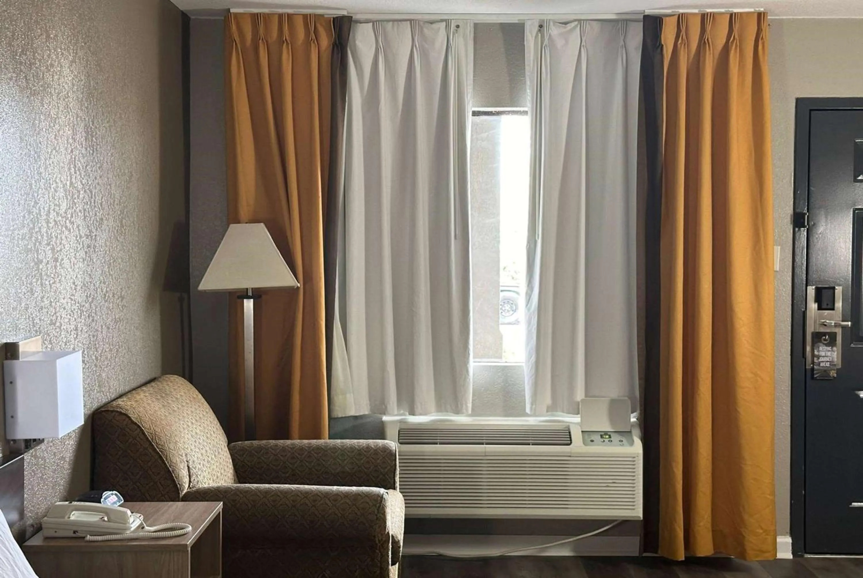 Seating area in Super 8 by Wyndham Monroe