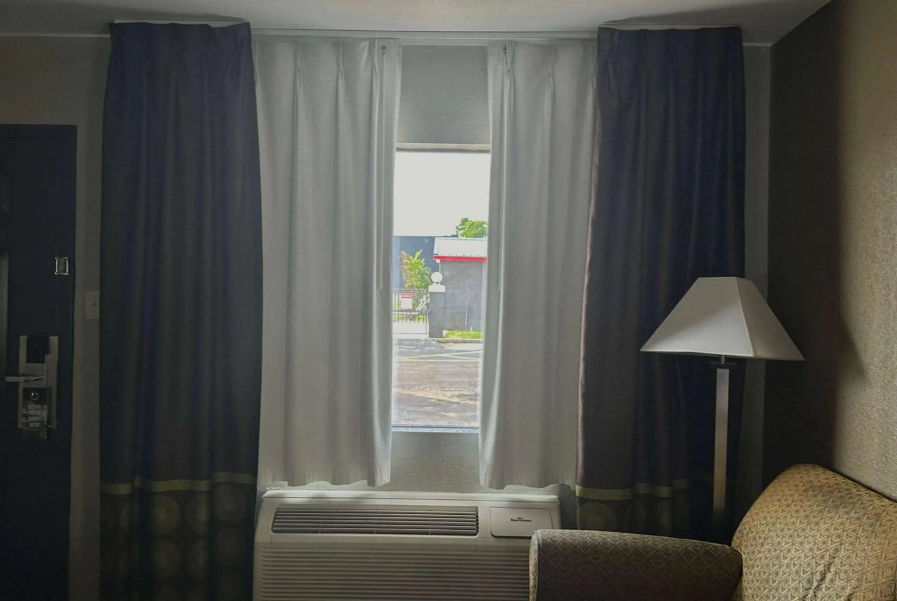 Seating area in Super 8 by Wyndham Monroe