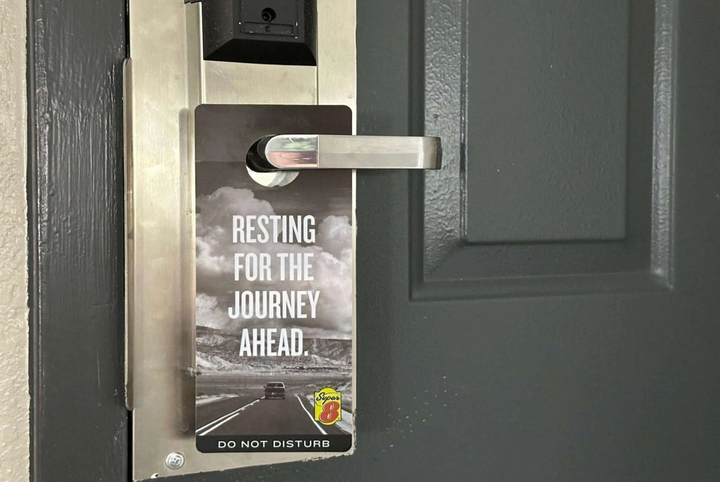 Property logo or sign in Super 8 by Wyndham Monroe