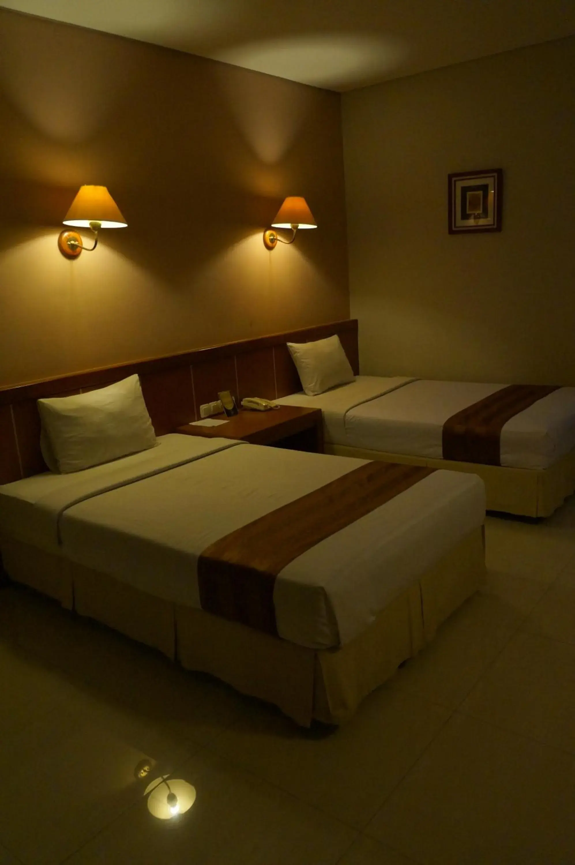 Bed in HOTEL ASRI CIREBON Bed in HOTEL ASRI CIREBON