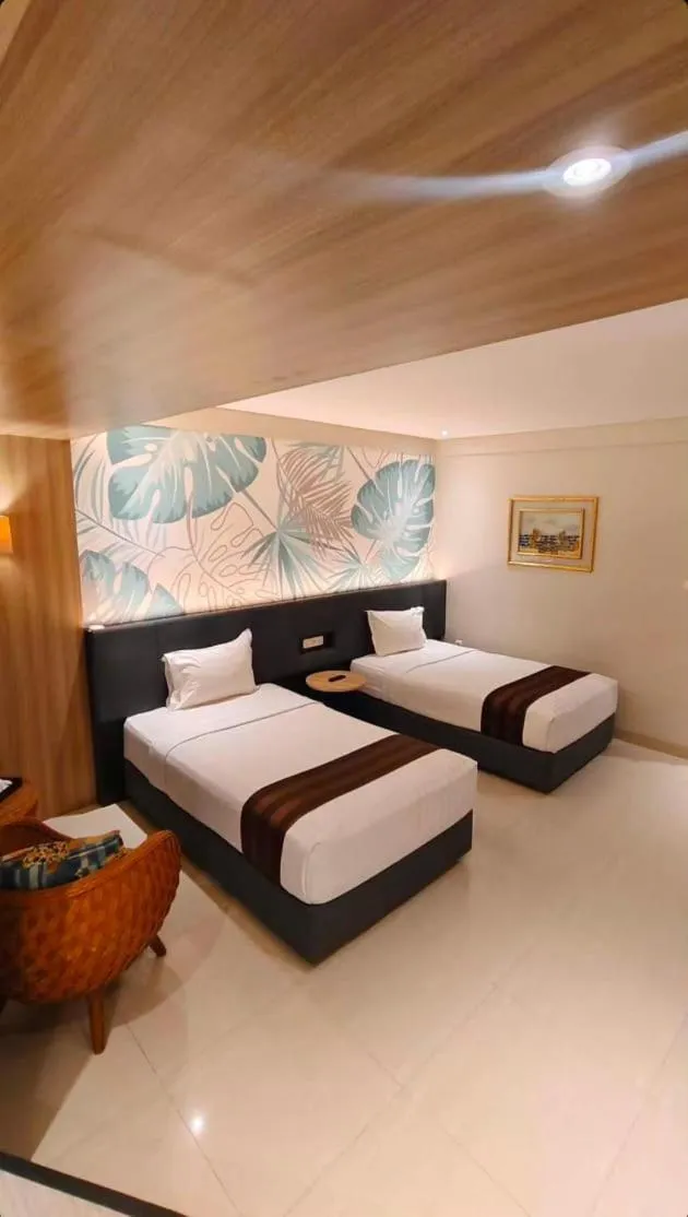 Photo of the whole room, Bed in HOTEL ASRI CIREBON