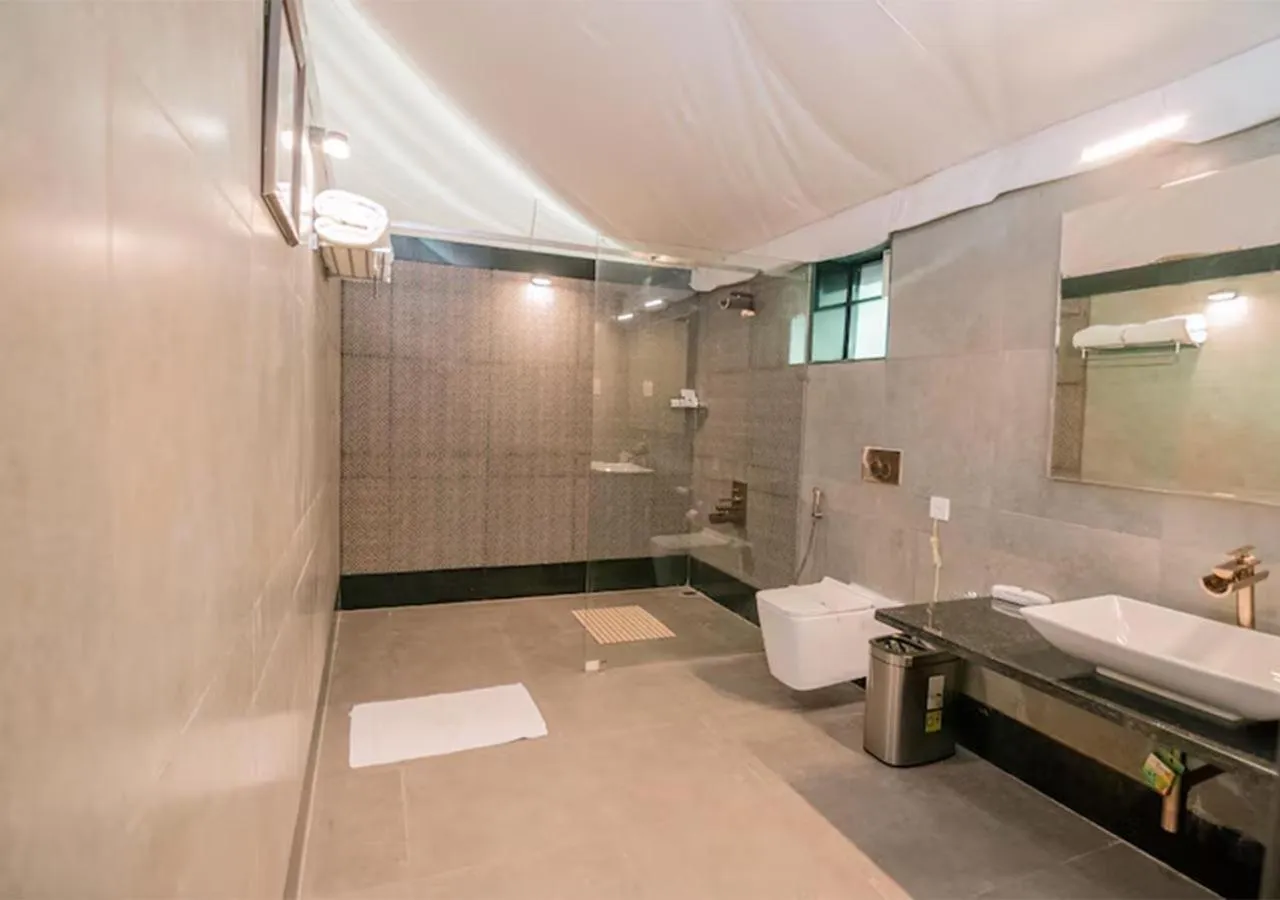 Bathroom in WelcomHeritage Tadoba Vanya Villas Resort & Spa