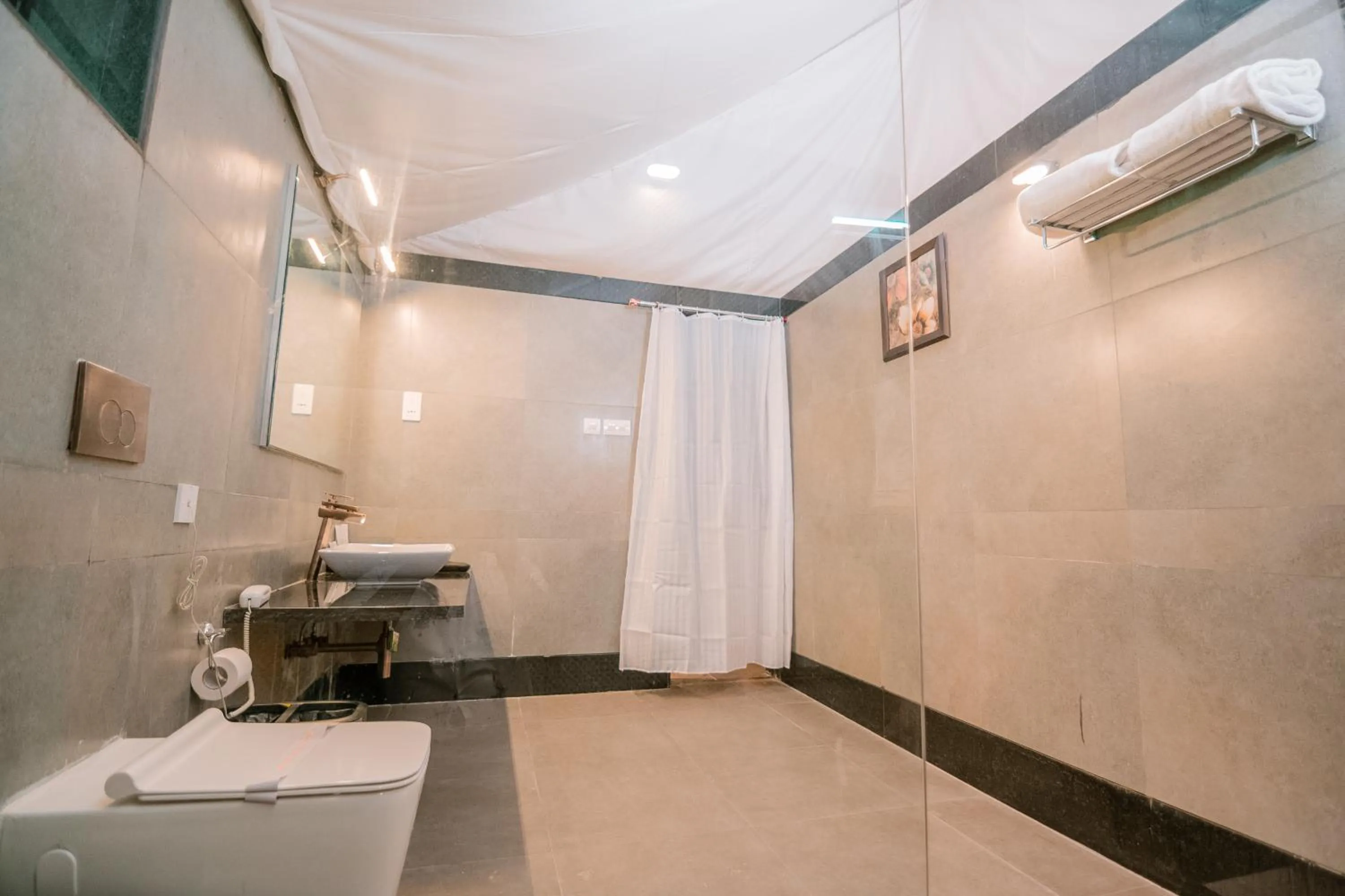 Bathroom in WelcomHeritage Tadoba Vanya Villas Resort & Spa