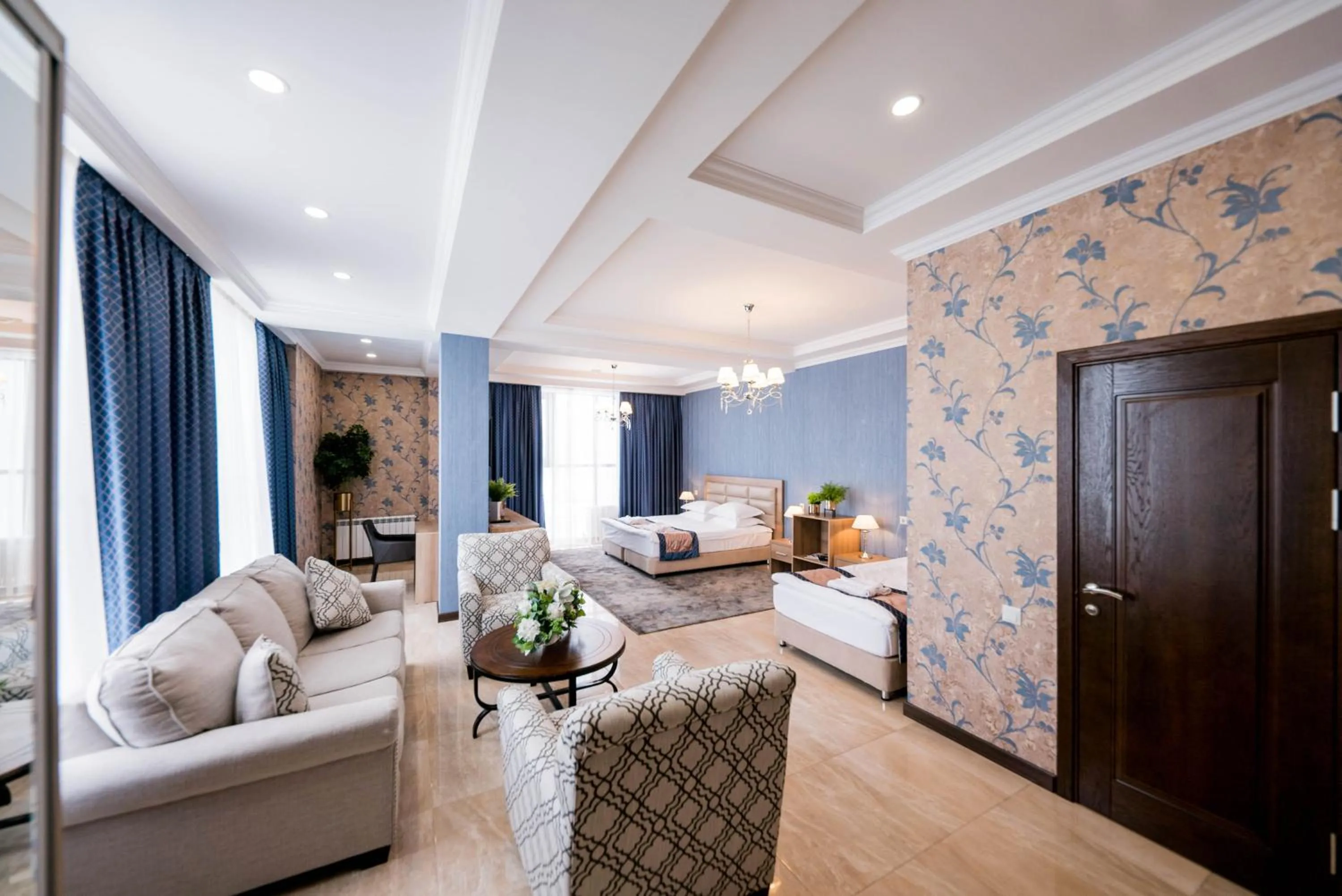 Living room, Bed in Oasis Residence