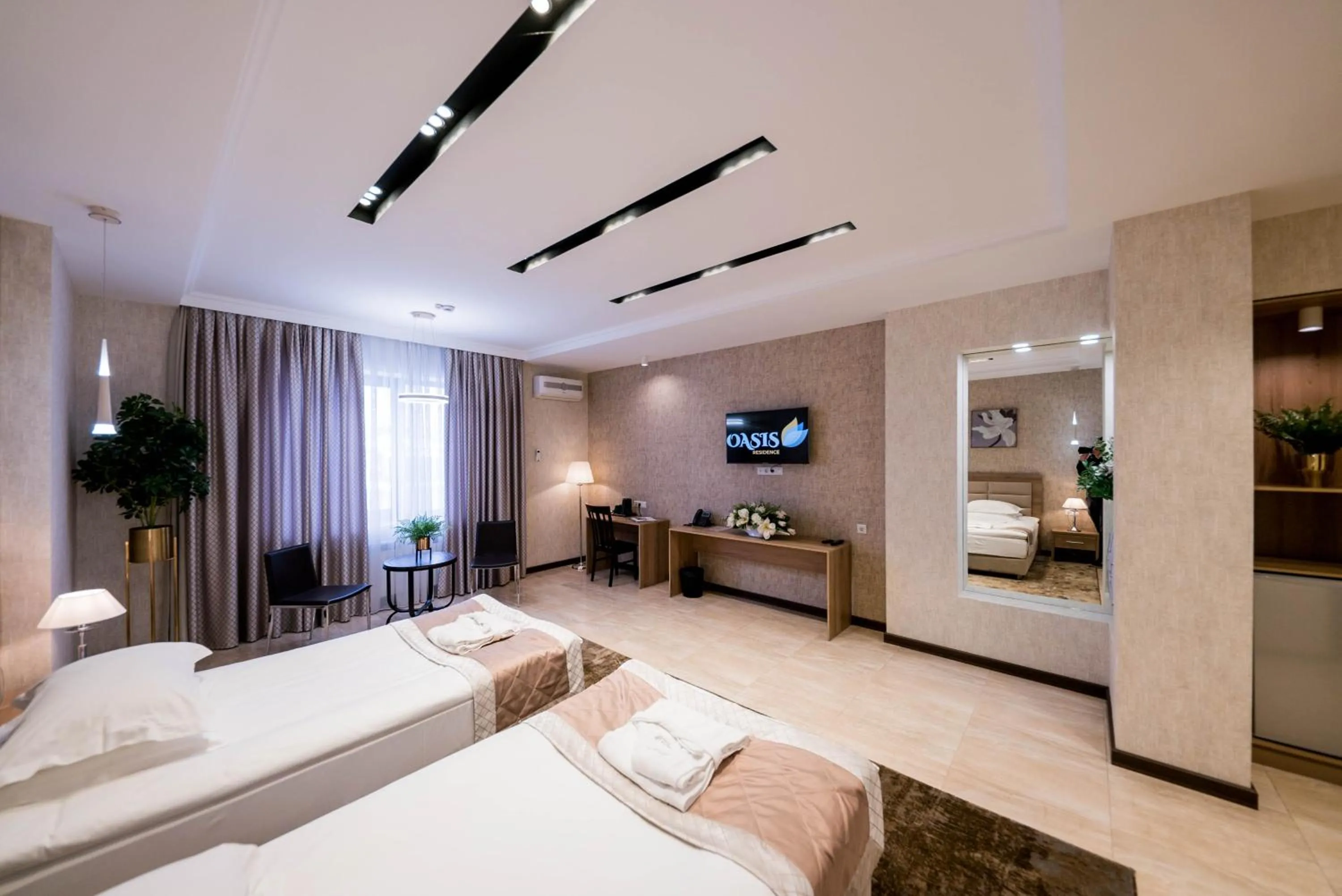 Photo of the whole room, Bed in Oasis Residence