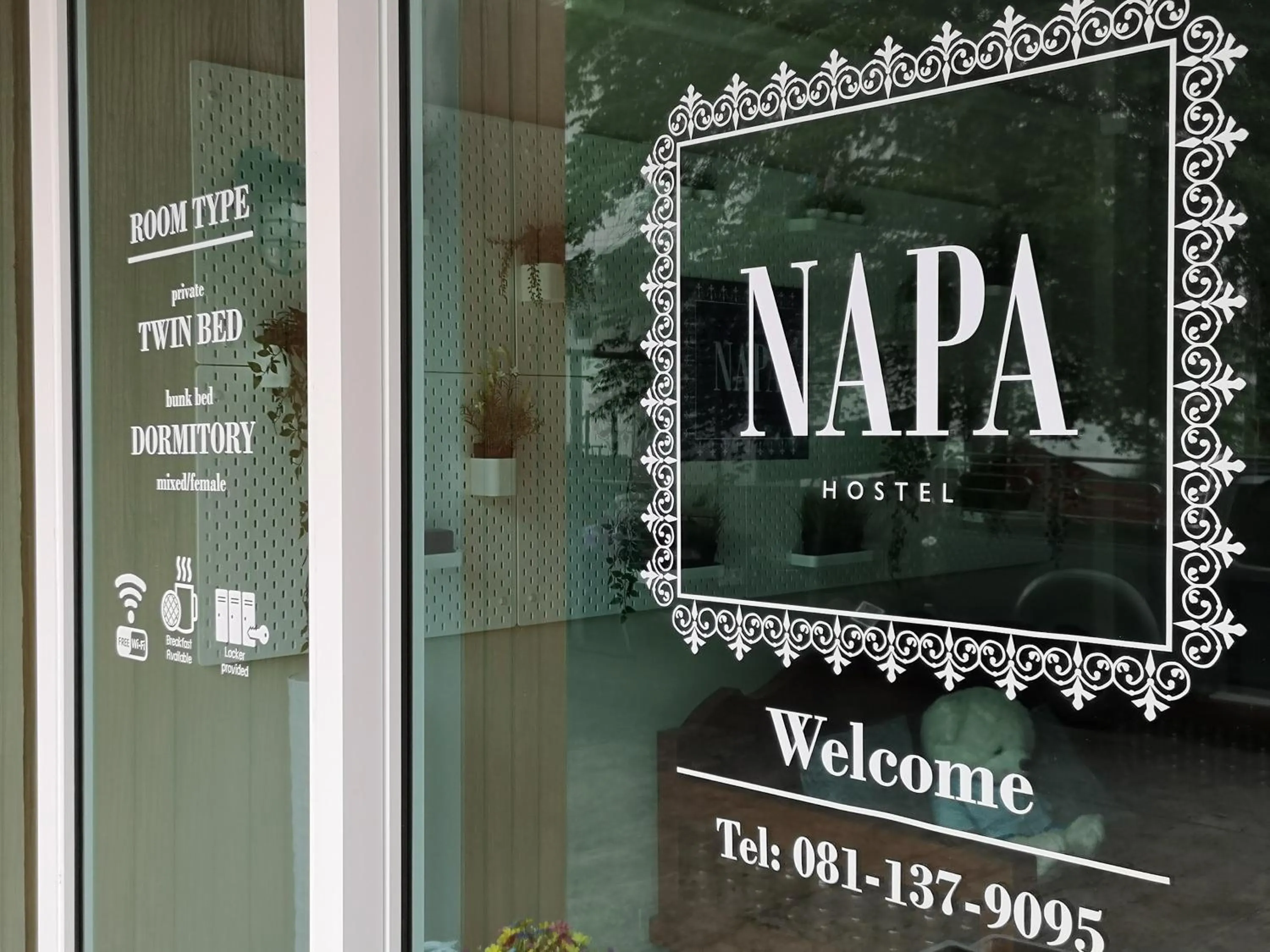 Facade/entrance in Napa Hostel Samrong Station