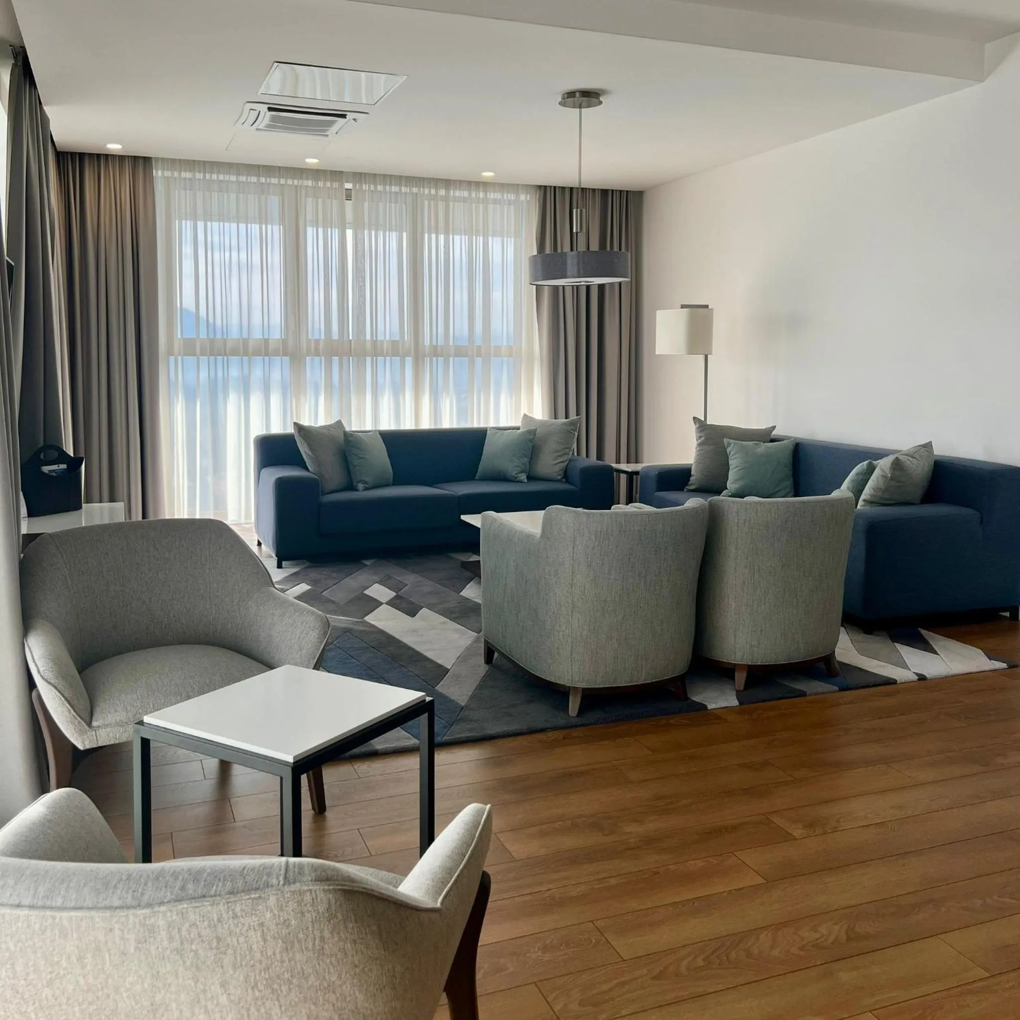 Living room in Bosmal Arjaan by Rotana