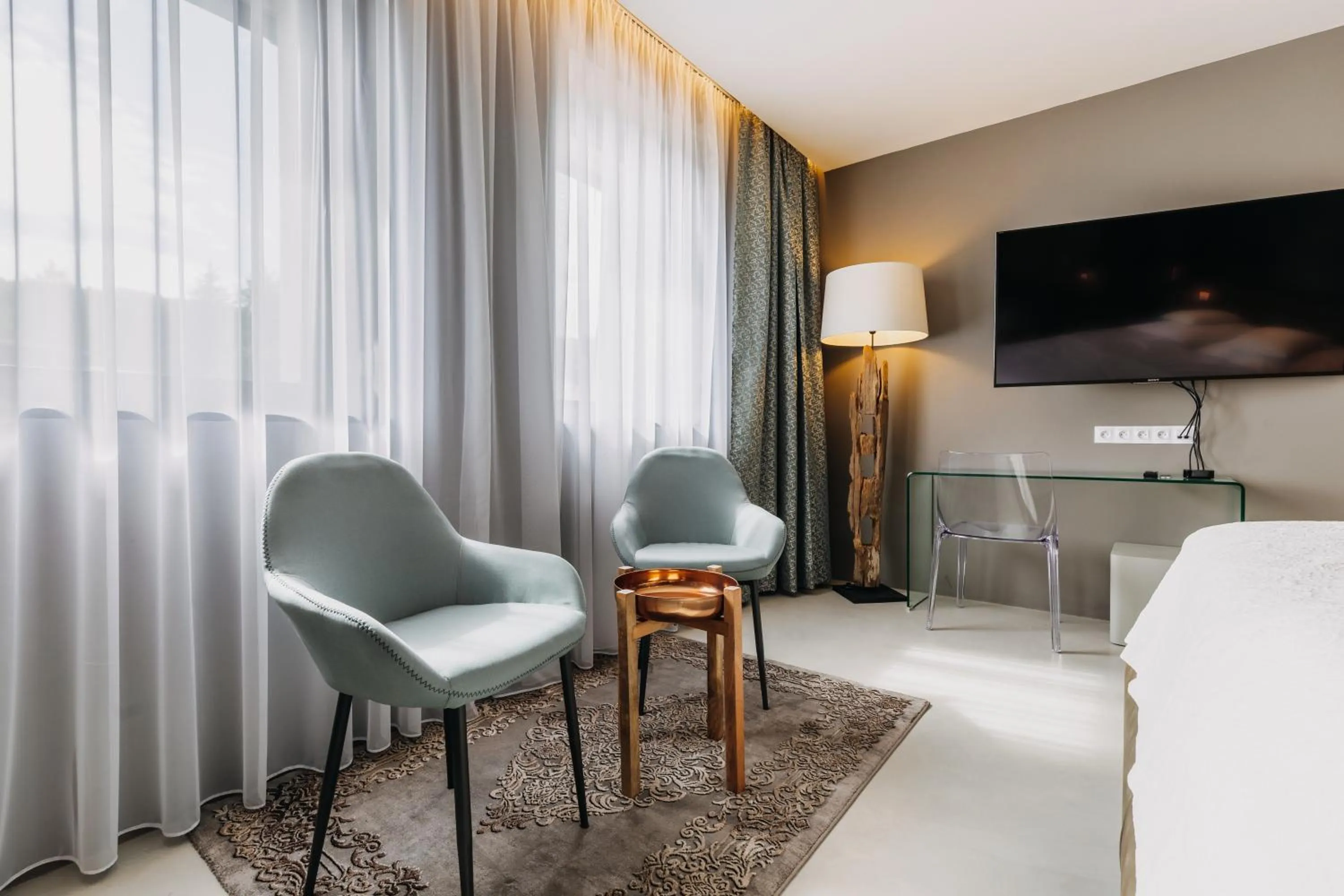 Seating area in VILLA BRICOLA - Boutique Apartments