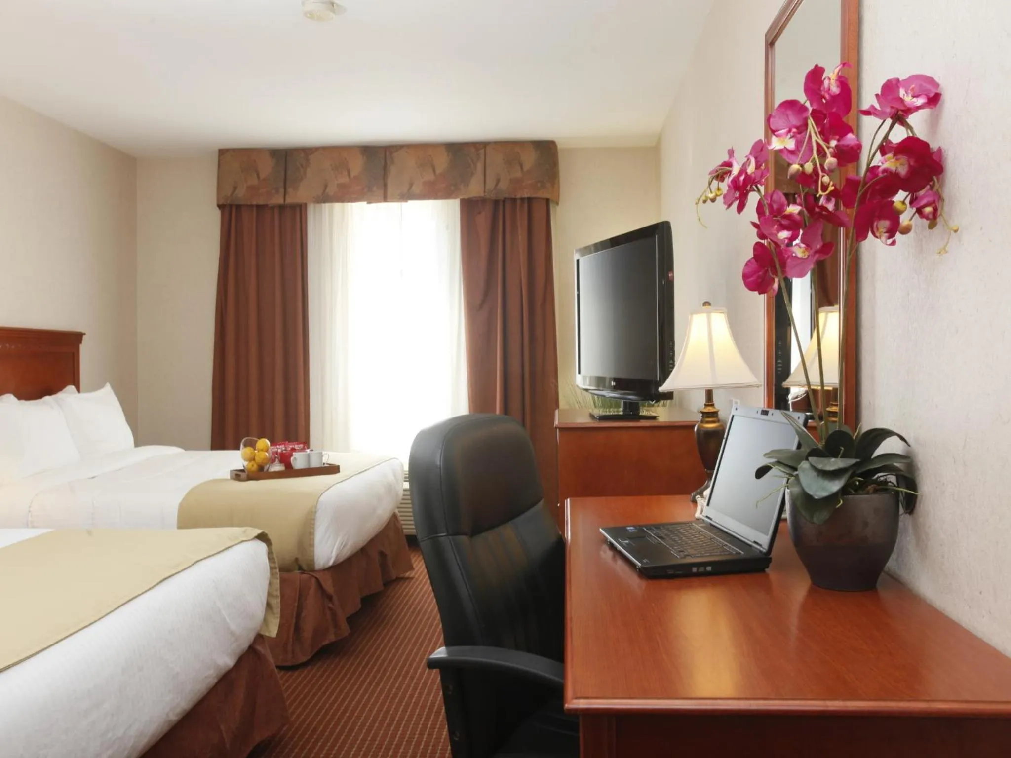 Photo of the whole room, Bed in Stonebridge Hotel Dawson Creek